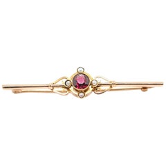 9 Karat Rose Gold Garnet Pin /Brooch Surrounded by 4 Pieces of White Pearl