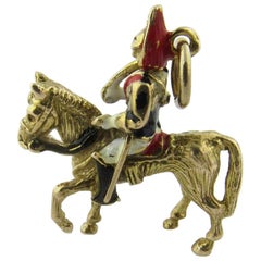 9 Karat Yellow Gold and Enamel British Soldier on Horse Charm