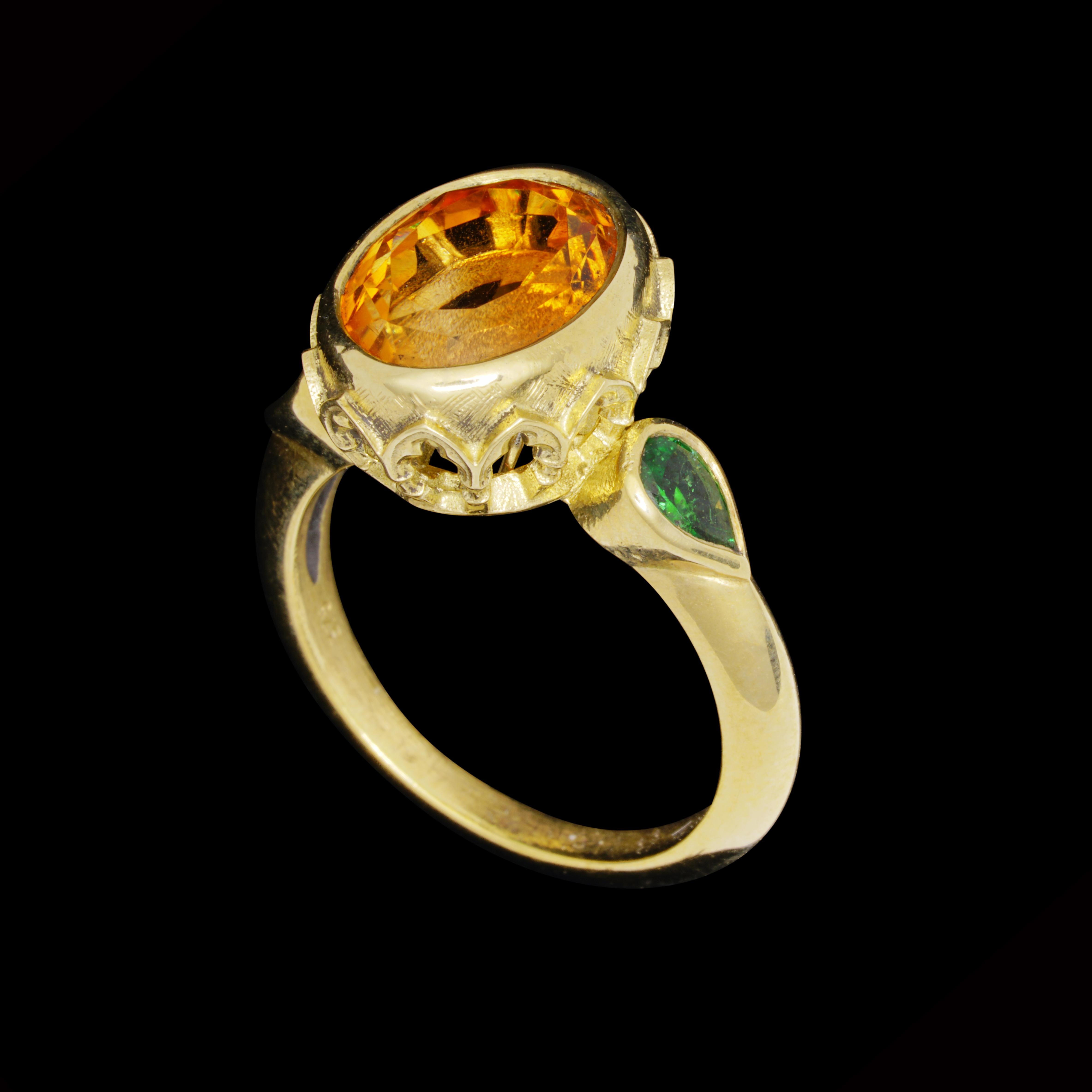 The vibrancy of this impeccable ring is utterly remarkable, it's colours conjuring the vivid orange groves of the garden of the Hesperides; Greek nymphs of evening and the golden light of sunsets.

Hand crafted in 9kt yellow gold, this alluring ring
