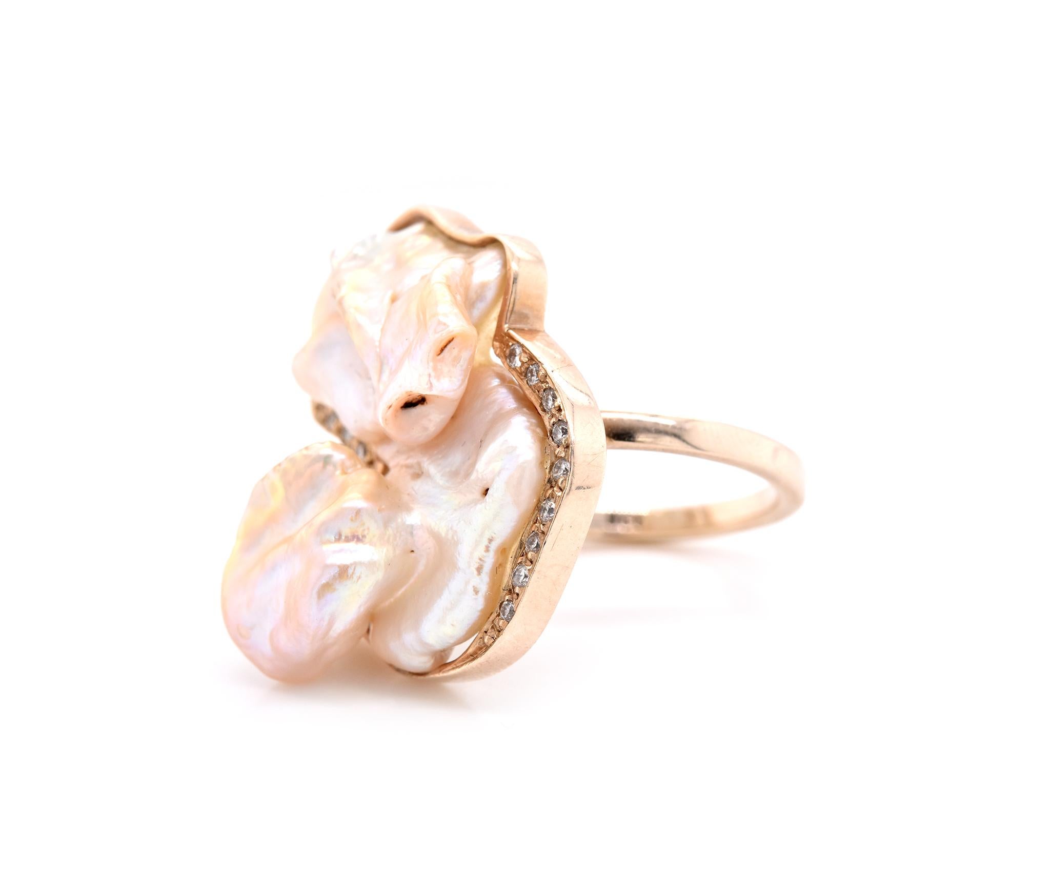 Material: 9k yellow gold
Pearl: 1 free form mother of pearl
Diamonds: 19 round brilliant cut = .60cttw 
Color: H
Clarity: SI1
Ring Size: 7.75 (please allow two additional shipping days for sizing requests)
Dimensions: ring measures 27.22 X