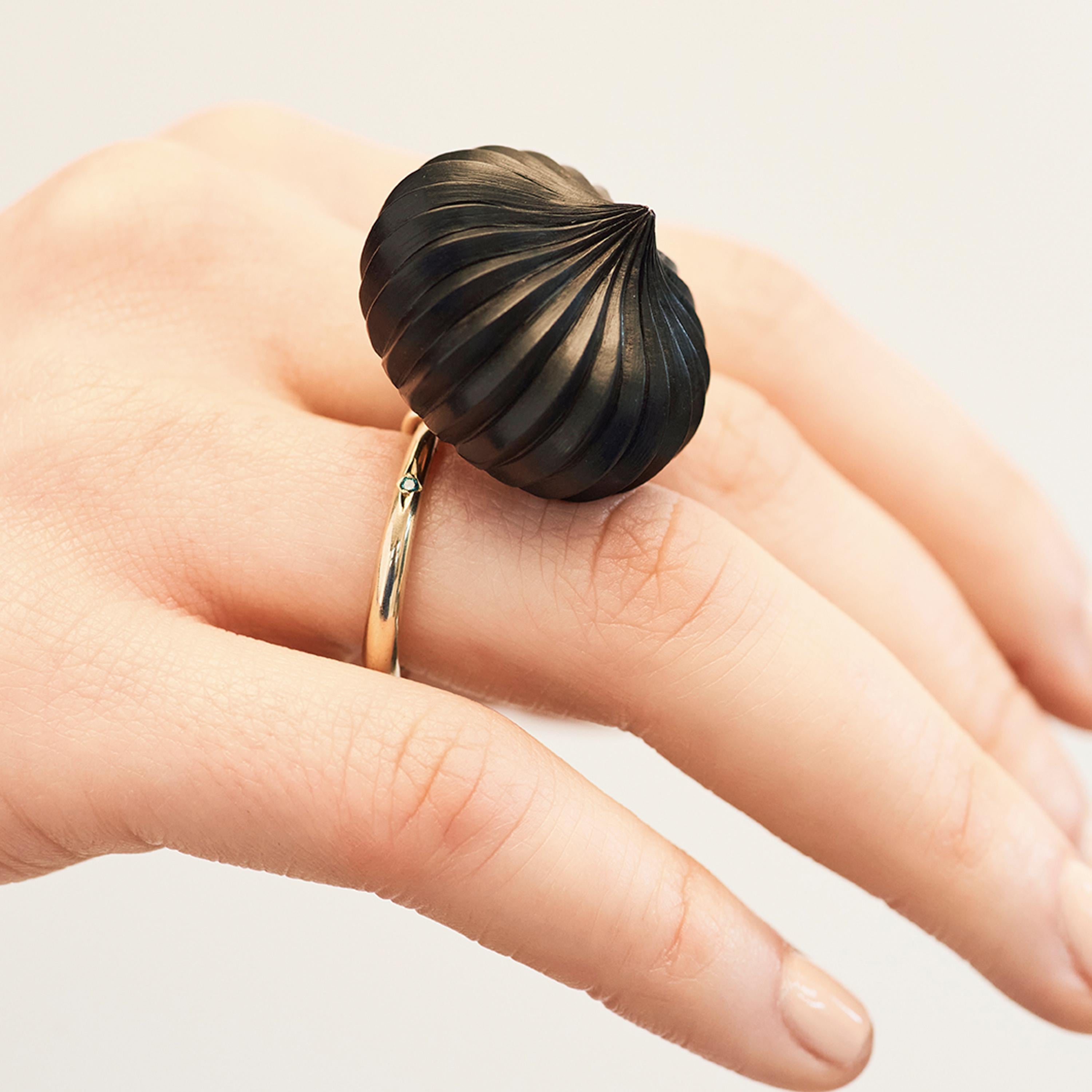 Alice Cicolini's fine quality Temple Indian Dome Ring is crafted from 9 karat yellow gold, hand carved ebony and a star-set blue diamond. These shapes of this ring were inspired by the temples of Uzbekistan, where sleek domes are covered in richly
