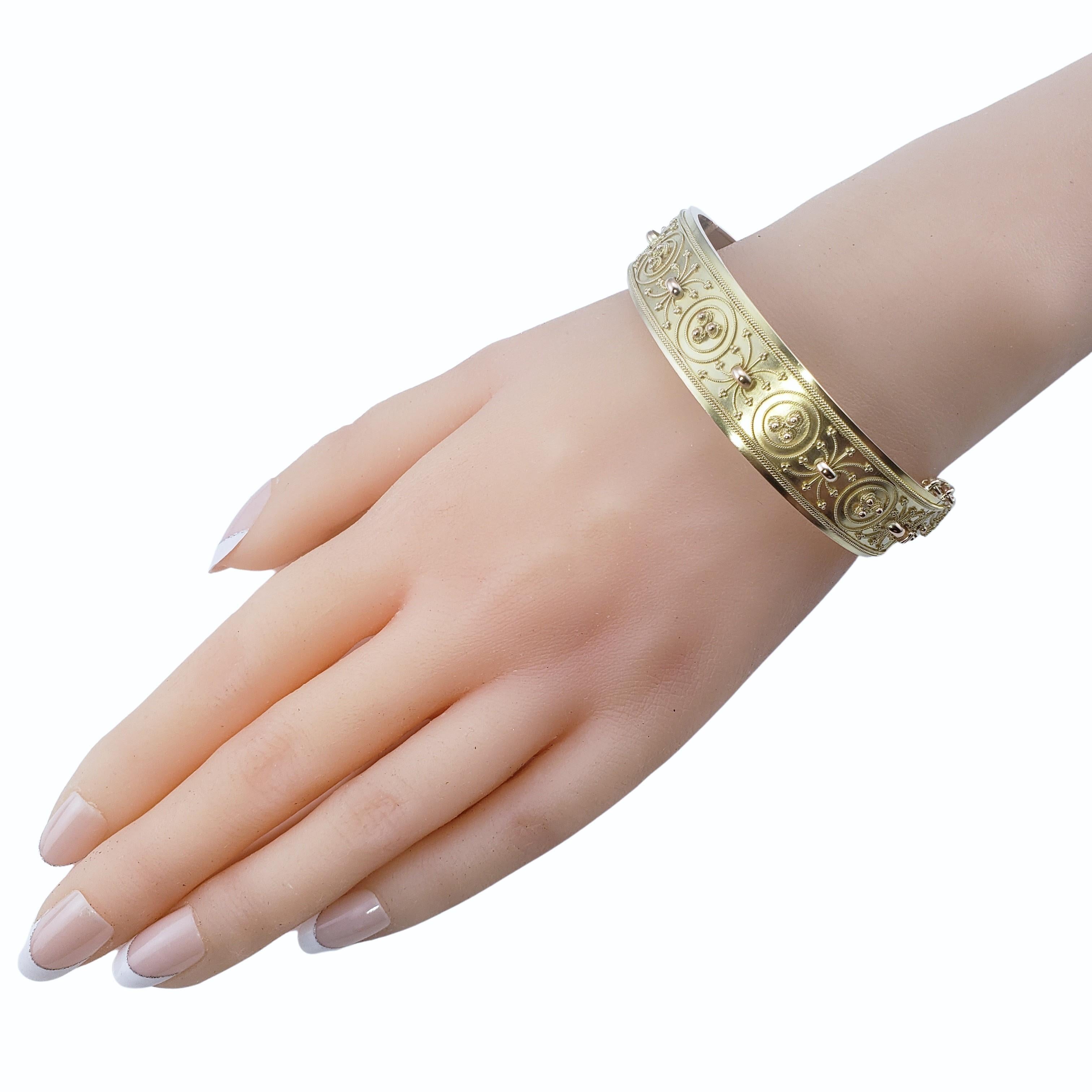 9 Karat Yellow Gold Hinged Bangle Bracelet 1