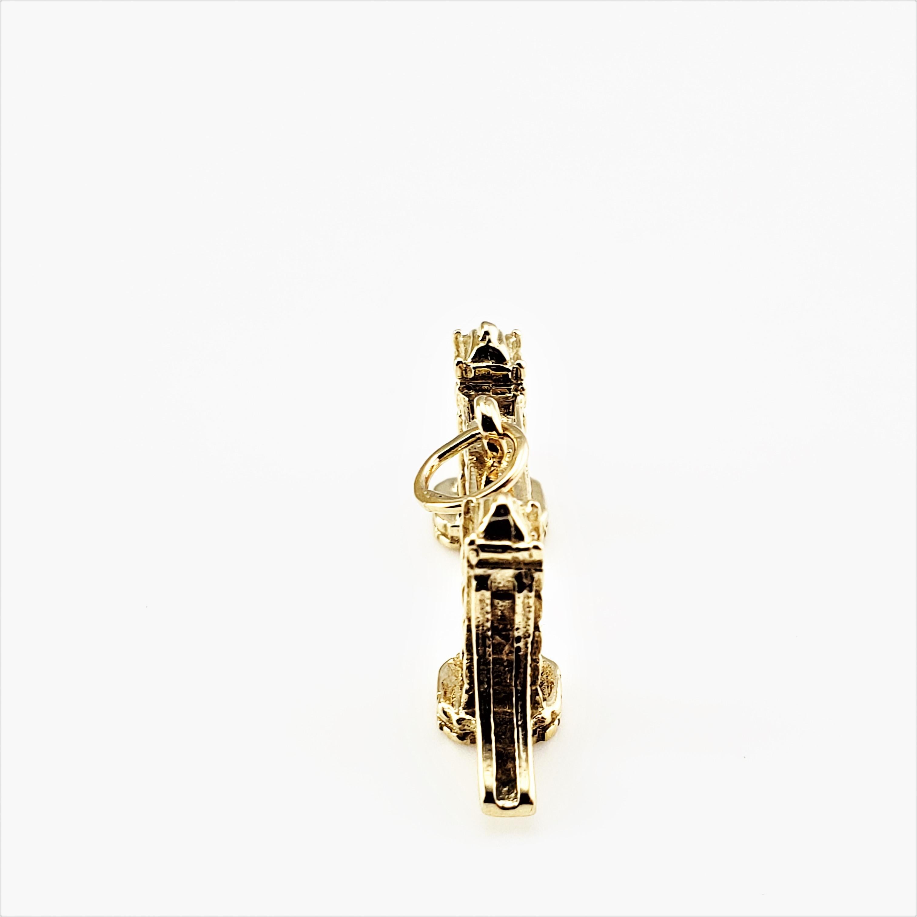 9 Karat Yellow Gold London Bridge Charm-

Perfect addition to your travel charm collection!

This lovely 3D charm features the iconic London Bridge meticulously detailed in 9K yellow gold.

*Chain not included

Size:  13 mm x  30 mm (actual