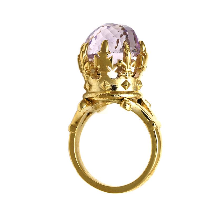 The Imperial Crown Ring is a royal one of a kind piece that fits a size 5 1/2 (Australian & British Size L)
Handcrafted in 9kt yellow gold, this alluring ring features a 12mm, round, checkerboard cut, dome morganite.

This exquisite pastel stone is