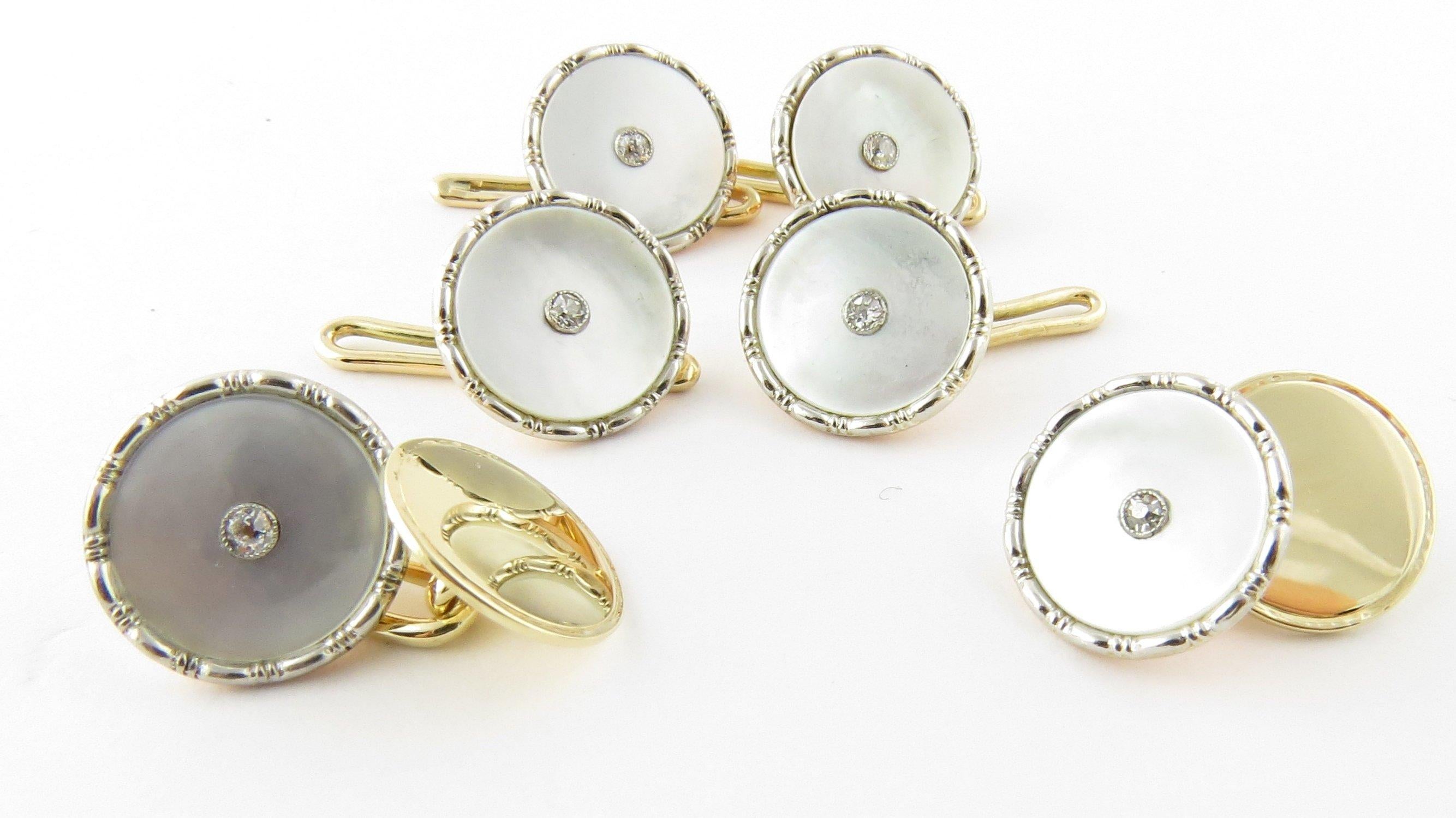 Vintage 9 Karat Yellow Gold Mother-of-Pearl and Diamond Tuxedo Buttons and Cufflinks. This elegant set includes one pair of cufflinks and four tuxedo buttons, each detailed with stunning mother-of-pearl and one European cut diamond set in