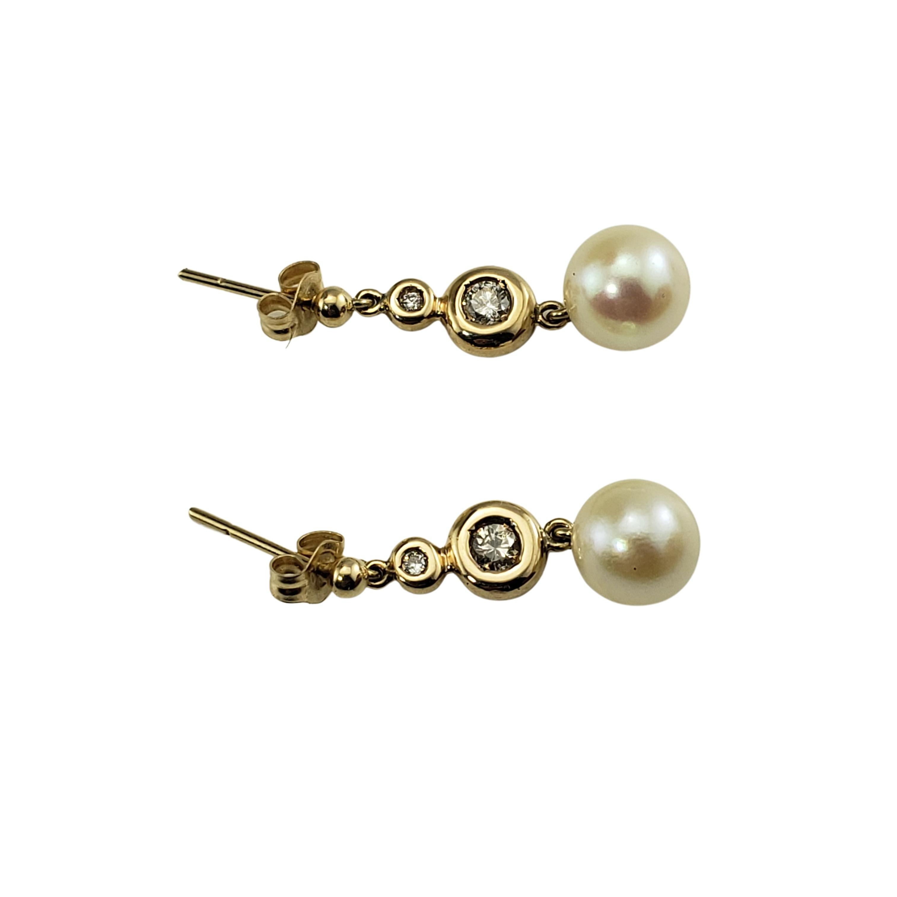 Brilliant Cut 9 Karat Yellow Gold Pearl and Diamond Dangle Earrings For Sale