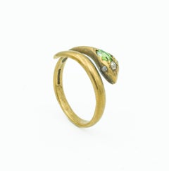 Snake Ring with Demantoid Garnet and Diamonds in 9 Karat Yellow Gold