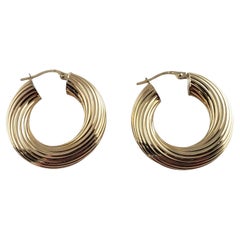 9 Karat Yellow Gold Twist Hoop Earrings #24778