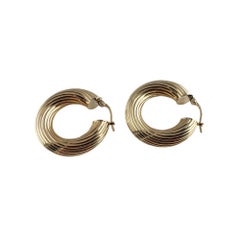 9 Karat Yellow Gold Twist Hoop Earrings