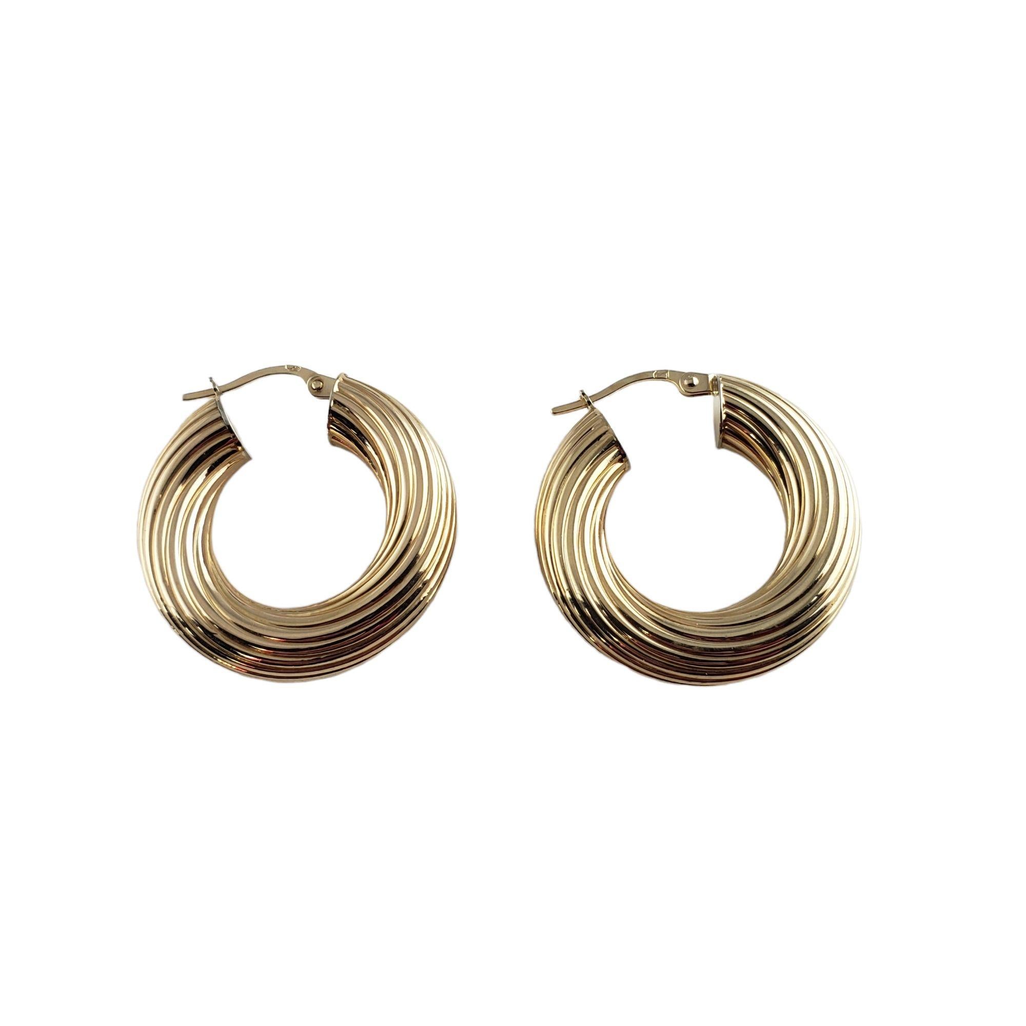 Women's 9 Karat Yellow Gold Twist Hoop Earrings For Sale