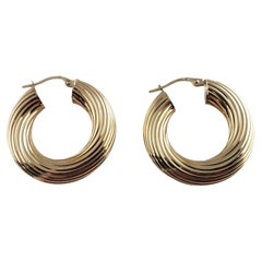 9 Karat Yellow Gold Twist Hoop Earrings