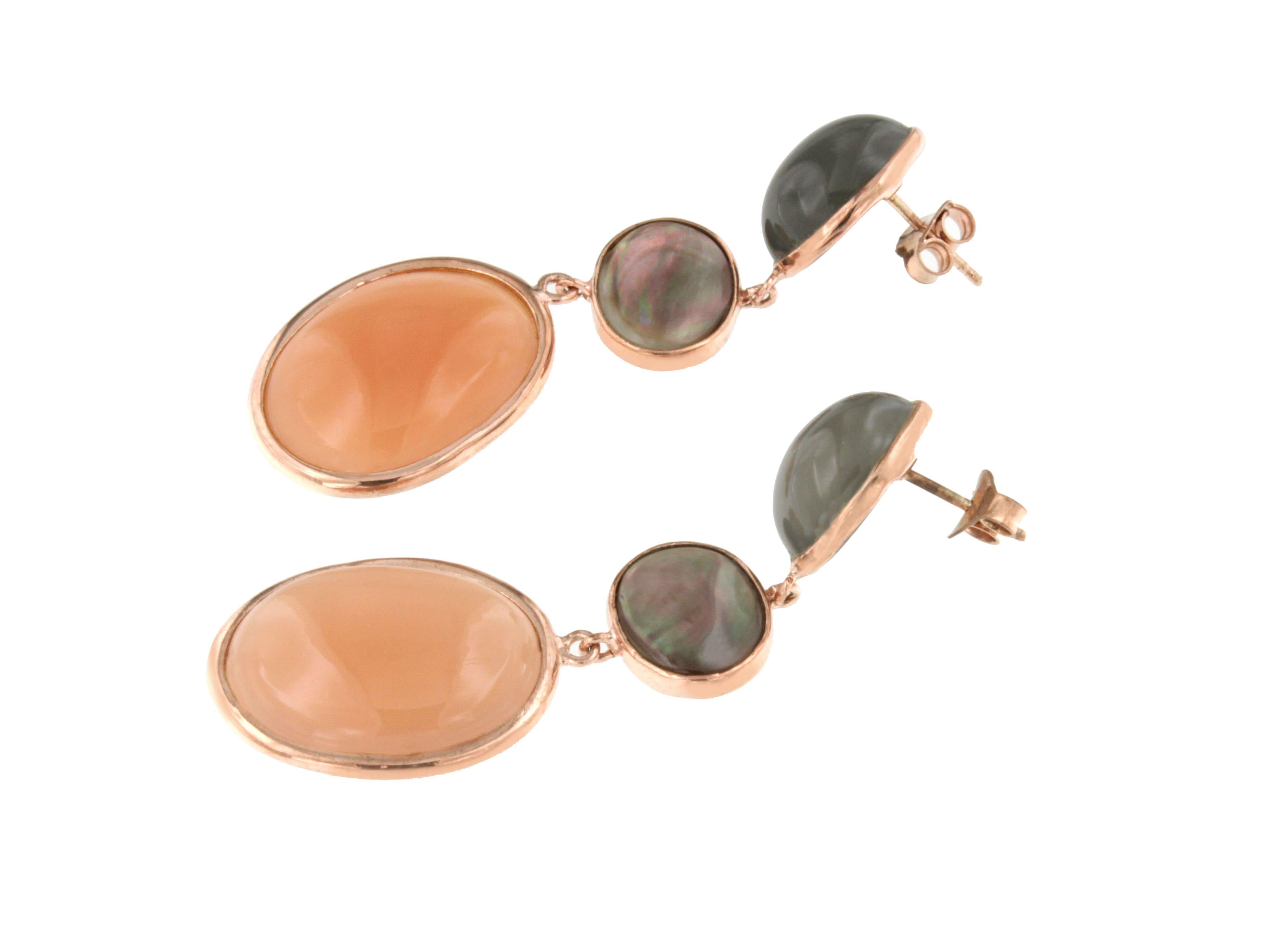 Earrings in rose gold 9 Karat with Grey Moonstone (oval cabochon cut, size: 10x14 mm), Black Mother of Pearl (oval cabochon cut, size: 10x12 mm) and Peach Moonstone (oval cabochon cut, size: 15x20 mm)

All Stanoppi Jewelry is new and has never been