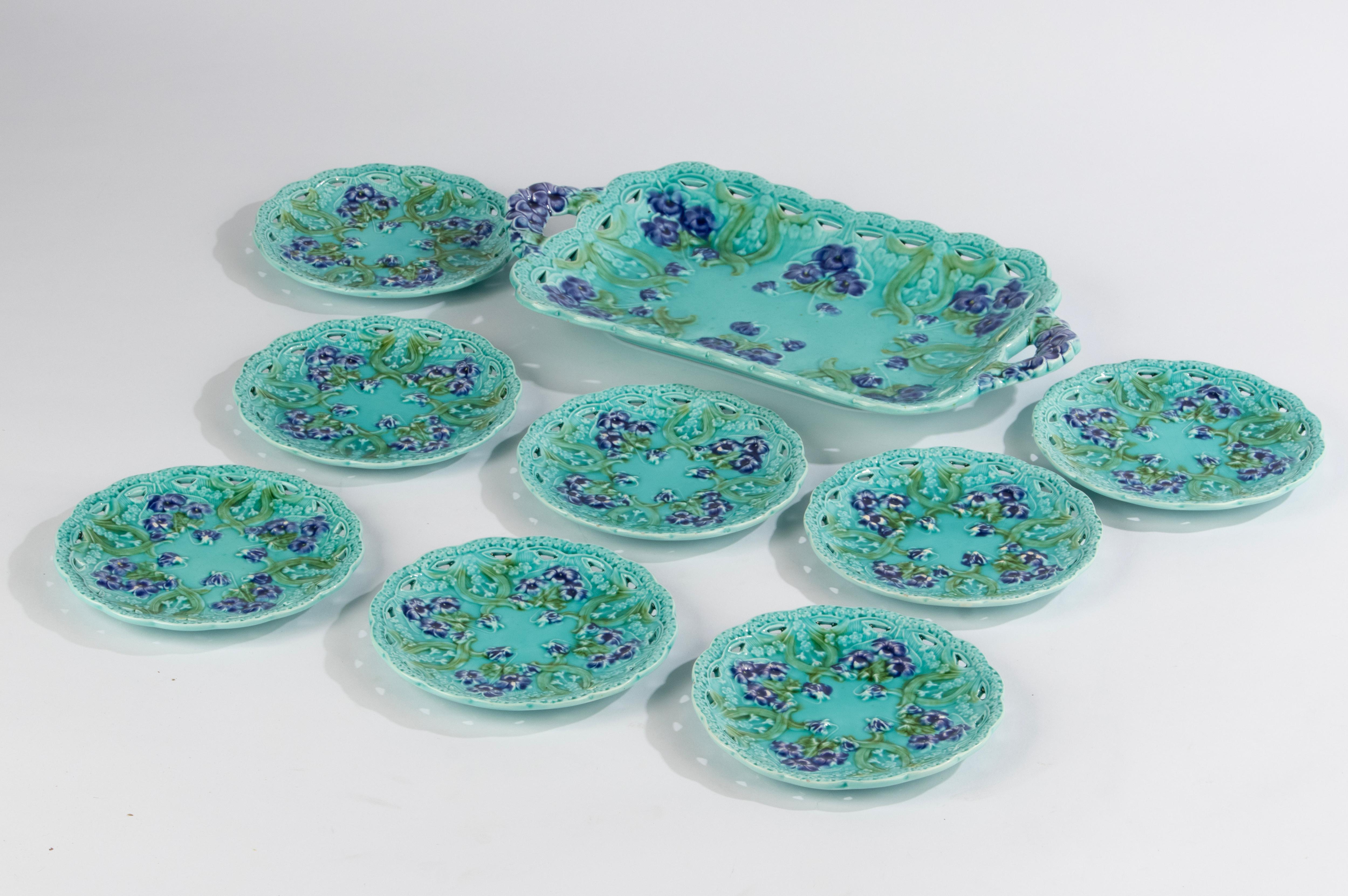 A beautiful majolica ceramic cake set, made by Villeroy & Boch. Nicely decorated in Art Nouveau style. All pieces are marked with a blind mark on the bottom. 
The set is in good condition. No chips and no hairlines. 

Dimensions: Serving tray 38 x