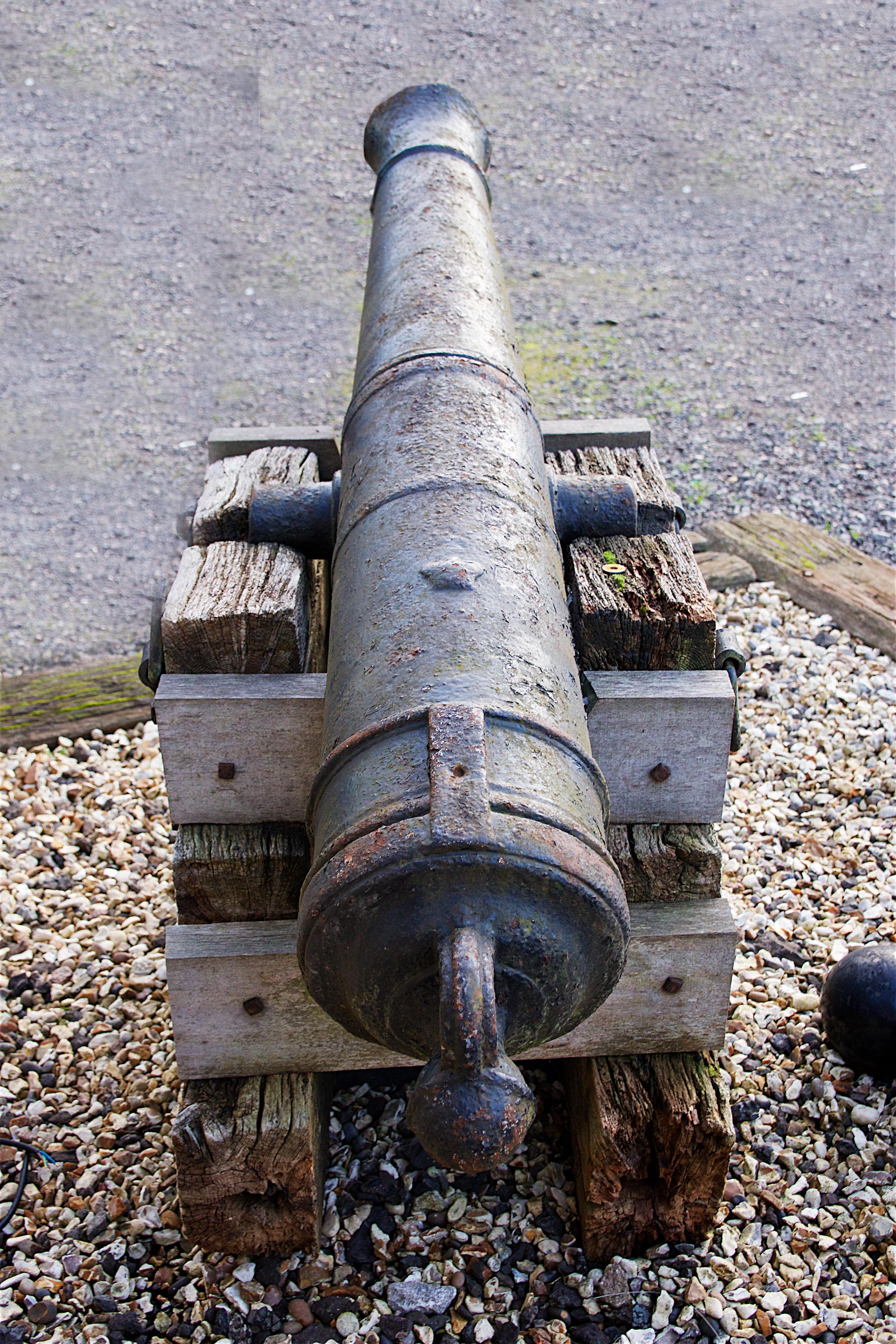 Early 19th century 9 pounder iron ships canon. English, circa 1805
Measures: Barrel length 67in
Barrel diameter 12in
Plinth width 20in.