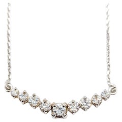 Collana con 9 pietre e diamanti in oro bianco 14k