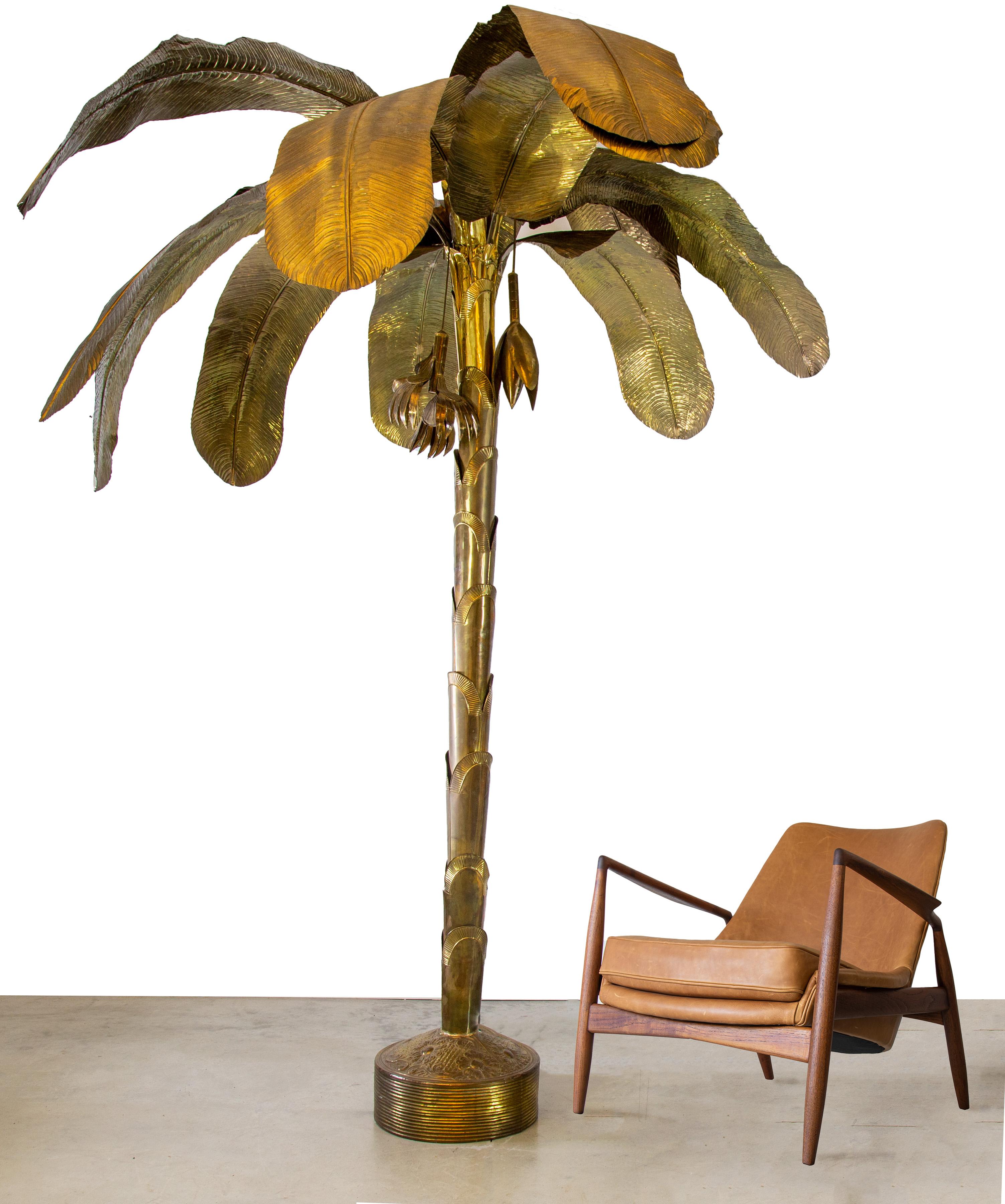 A large brass palm tree sure to take your interior space to the next level. The was purchased in the 1980s for over $8000 and is. Single family owner. Great patina to the brass which picks up light and shadows and makes it feel like a real tree. The