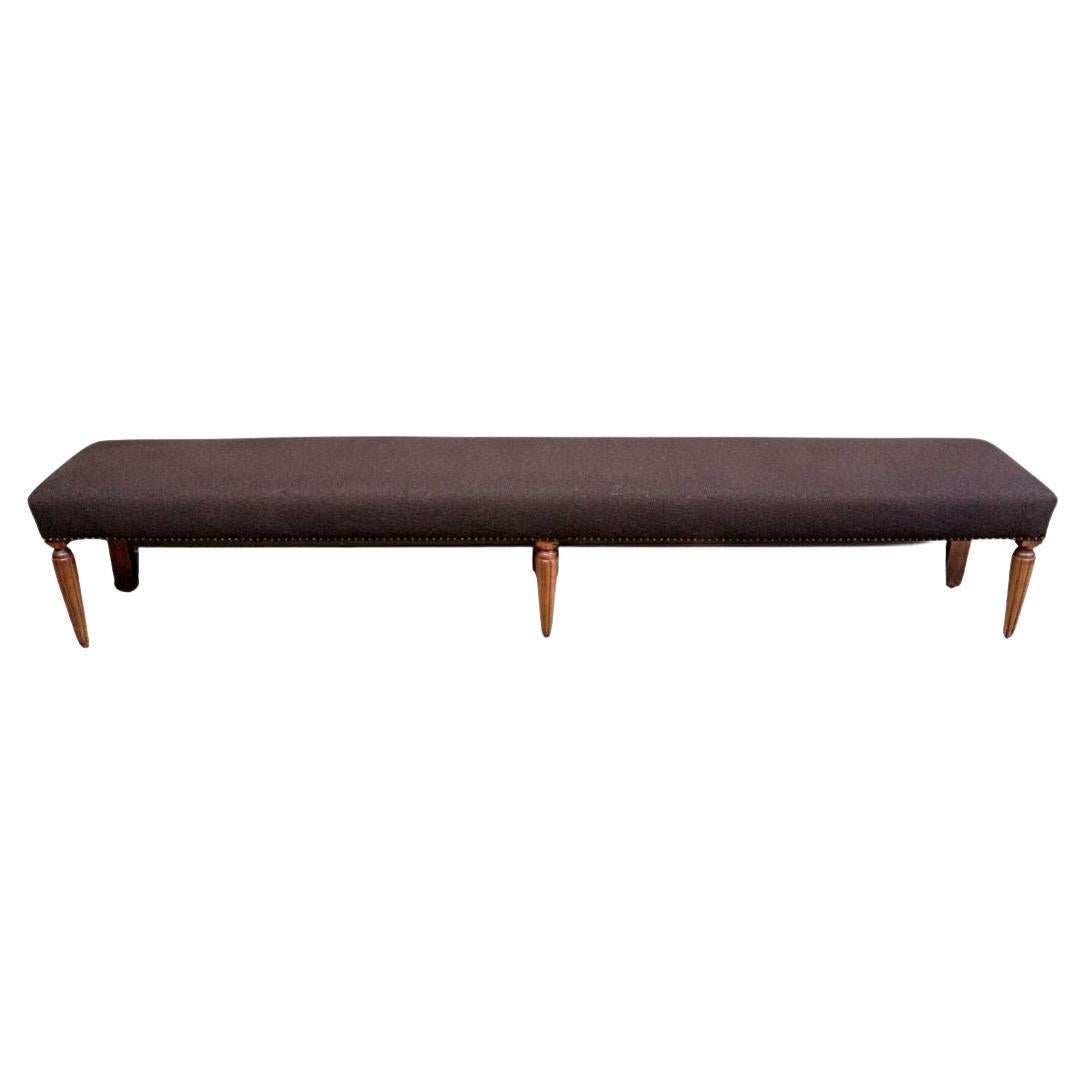 Long Upholstered Bench with Nail Head and Fluted Leg Details
