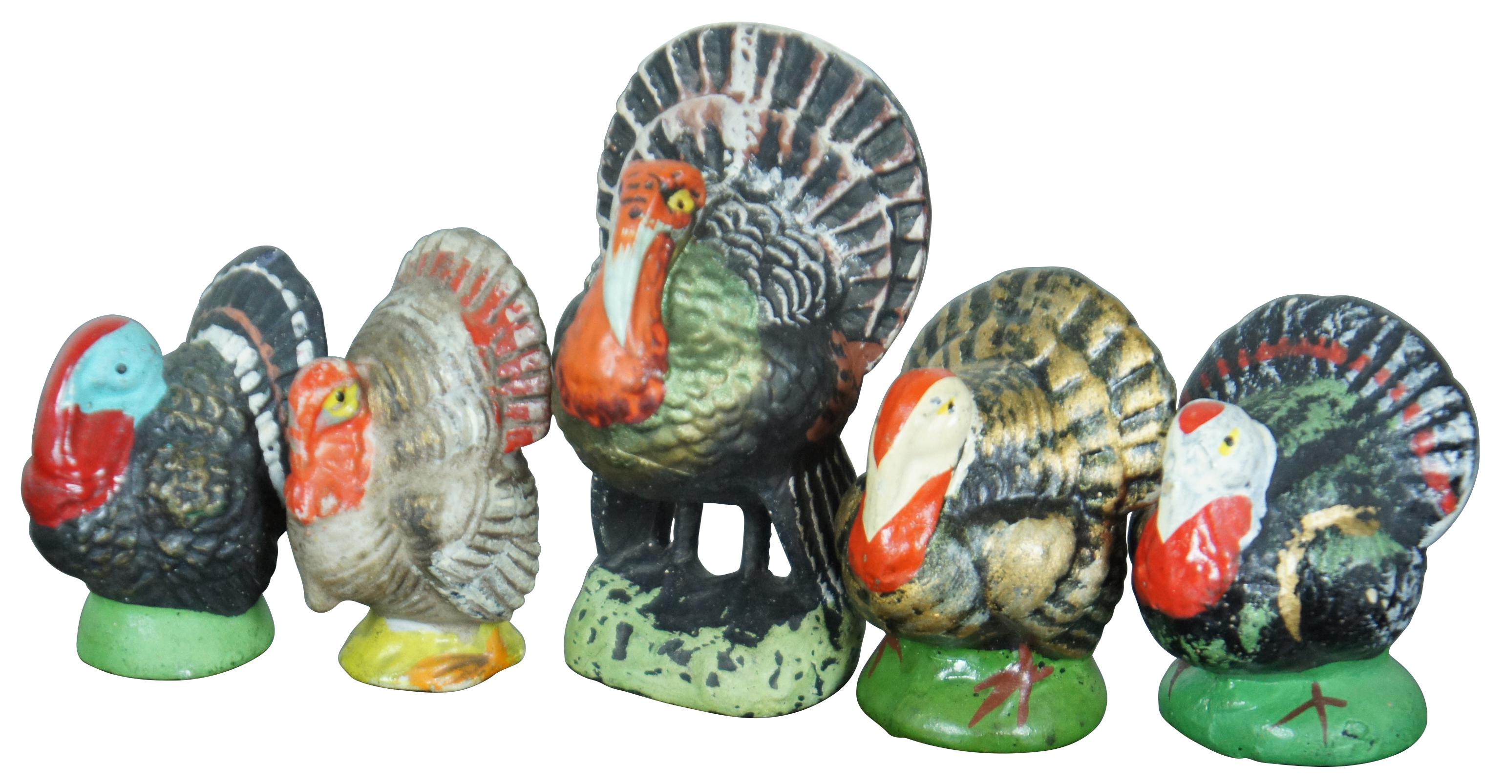 Lot of nine small antique/vintage Thanksgiving turkey shaped candy containers, seven composition and two ceramic; made in Japan.

Measures: Largest - 2.25” x 2” x 3.25” / Smallest - 1.75” x 1.5” x 2” (Width x Depth x Height).