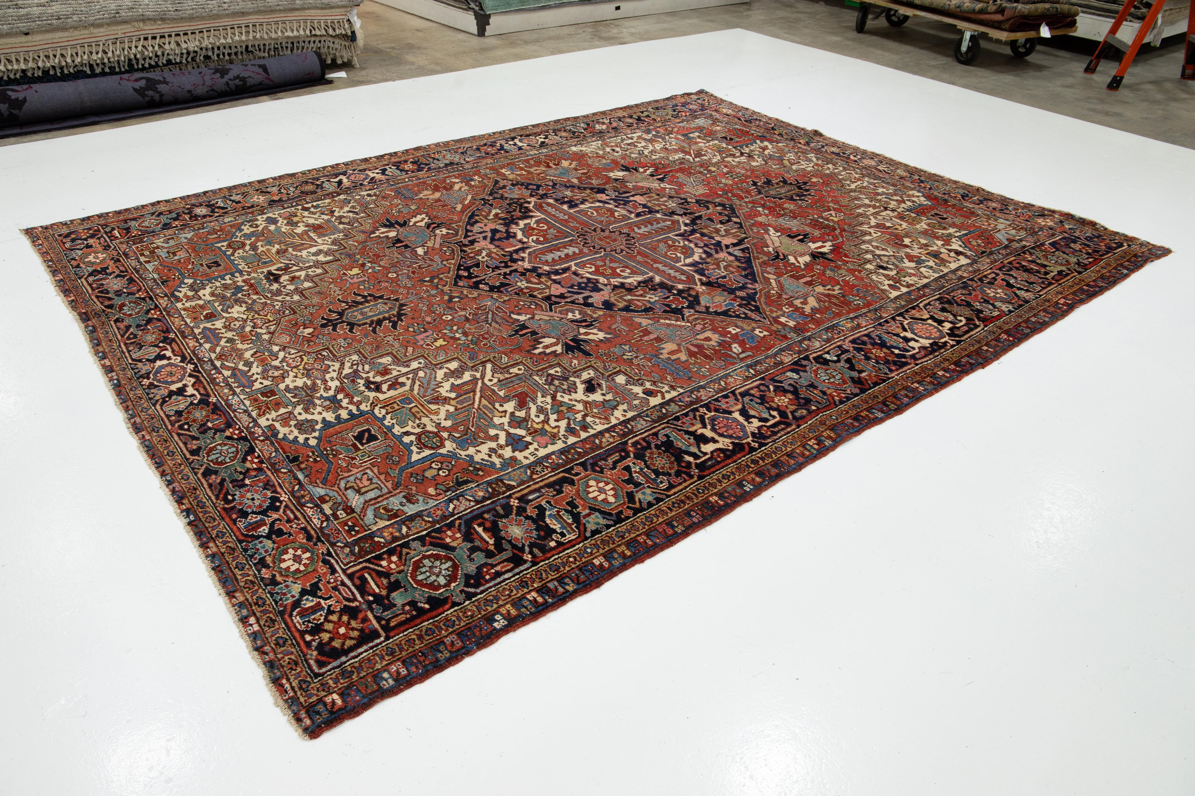 Heriz Serapi 9 x 12 Antique Persian Heriz Red Wool Rug With Medallion Design For Sale