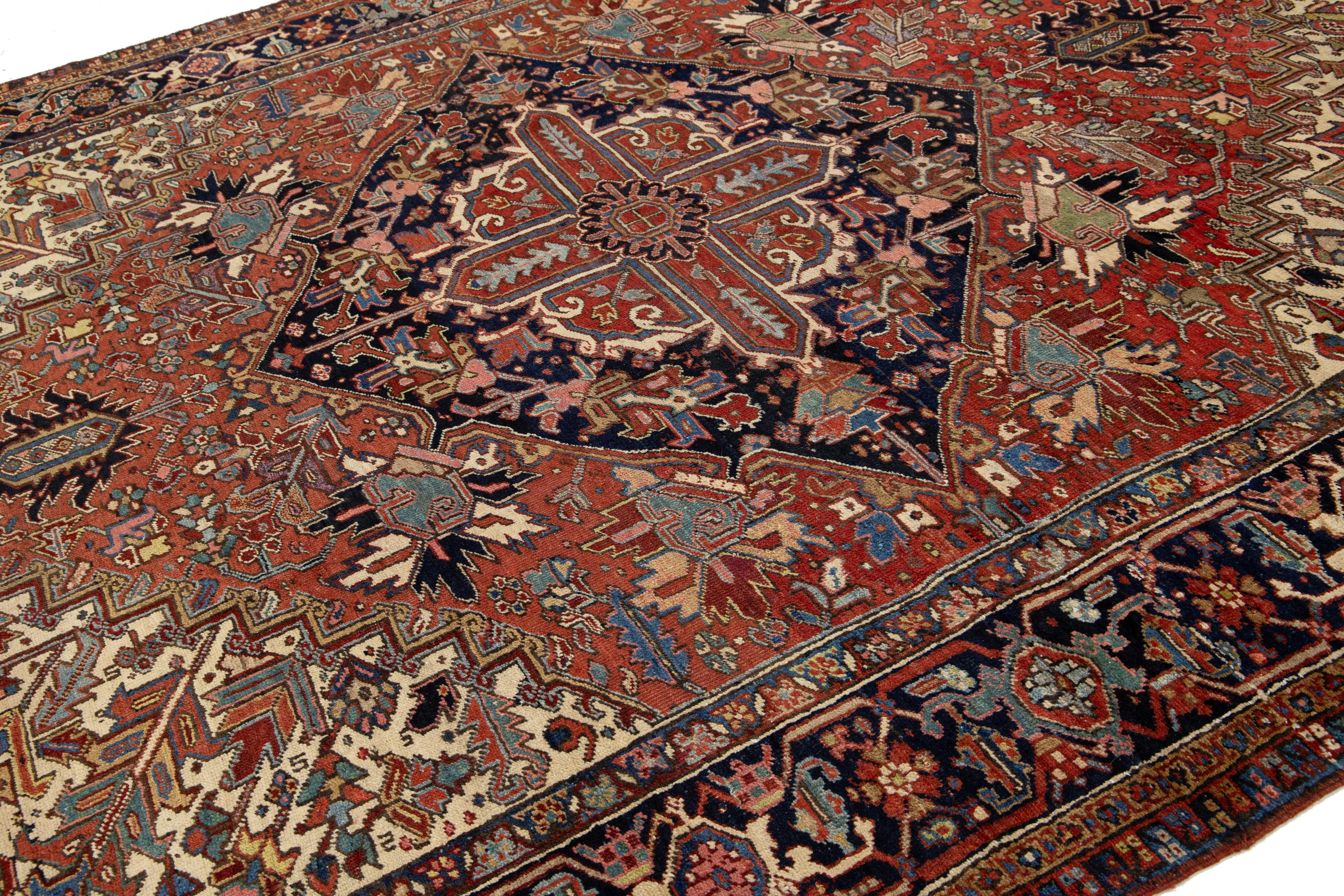 Hand-Knotted 9 x 12 Antique Persian Heriz Red Wool Rug With Medallion Design For Sale