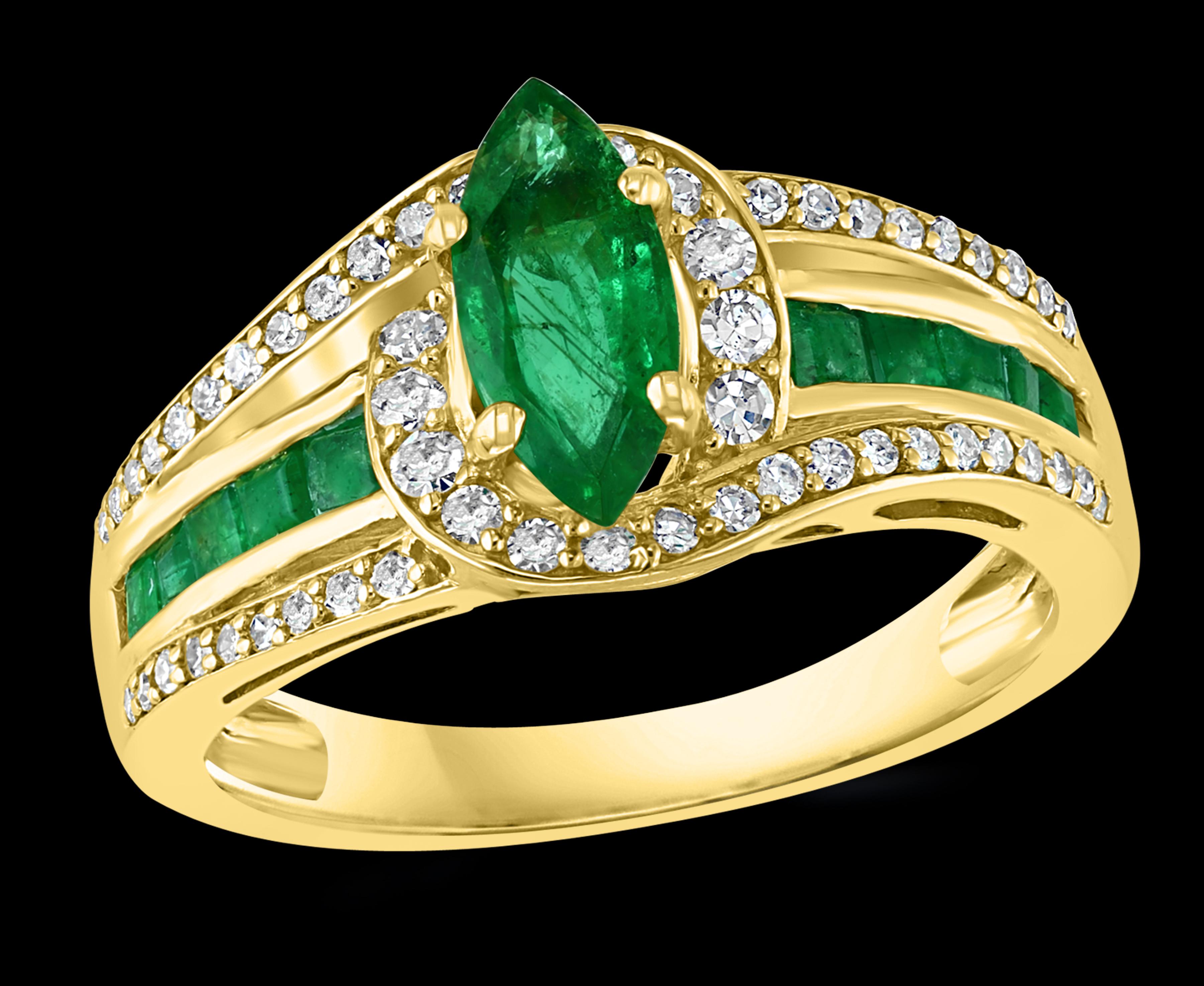 A classic, Cocktail ring 
9 X 5 Marquise Cut  Emerald And Diamond  Ring 14 Karat Yellow Gold Size 7
Marquis Shape  Emerald Ring 
Intense green color But has inclusions as all natural emeralds have inclusions.  Diamond on both side of the band and