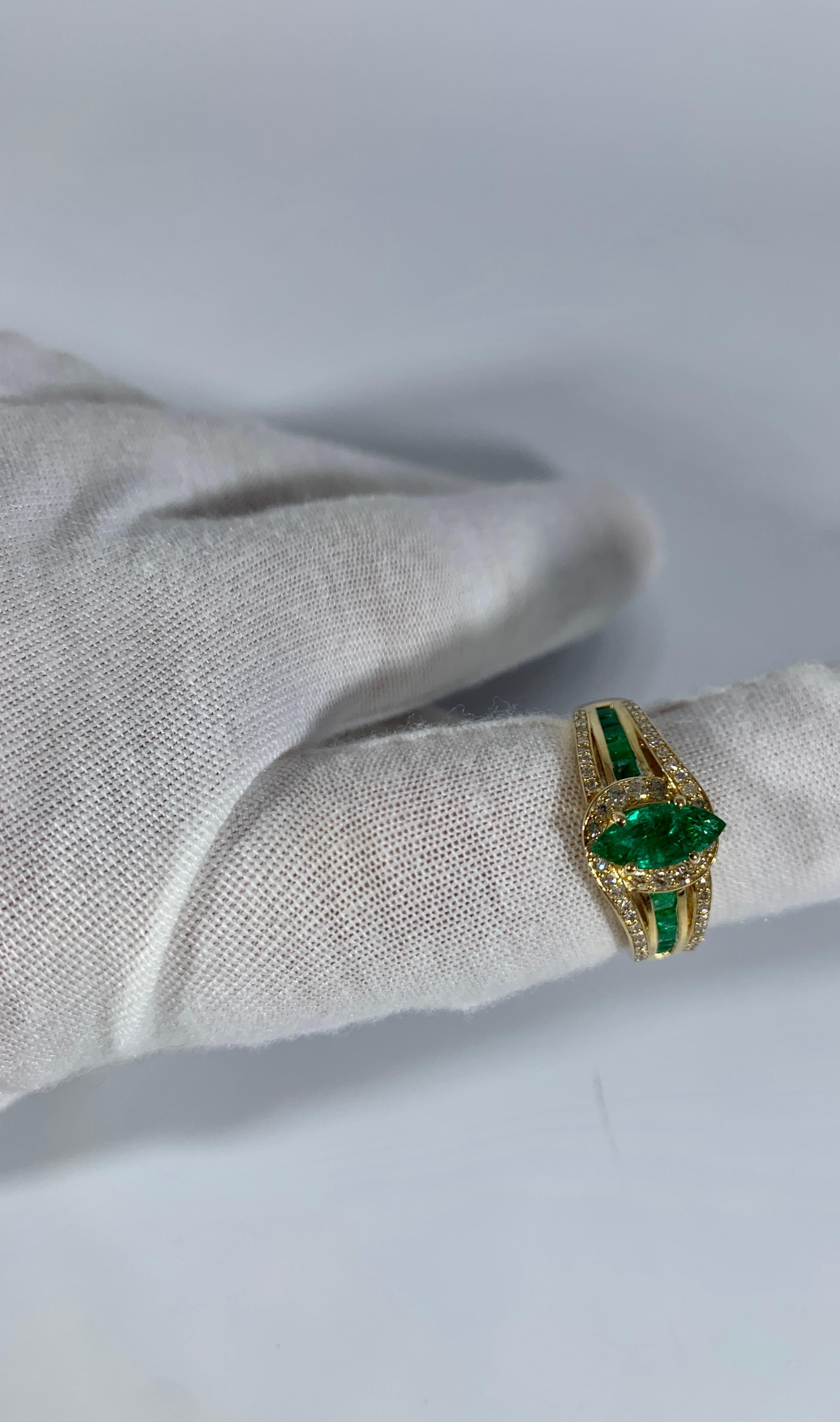 Marquise Cut Emerald and Diamond Ring 14 Karat Yellow Gold In Excellent Condition In New York, NY