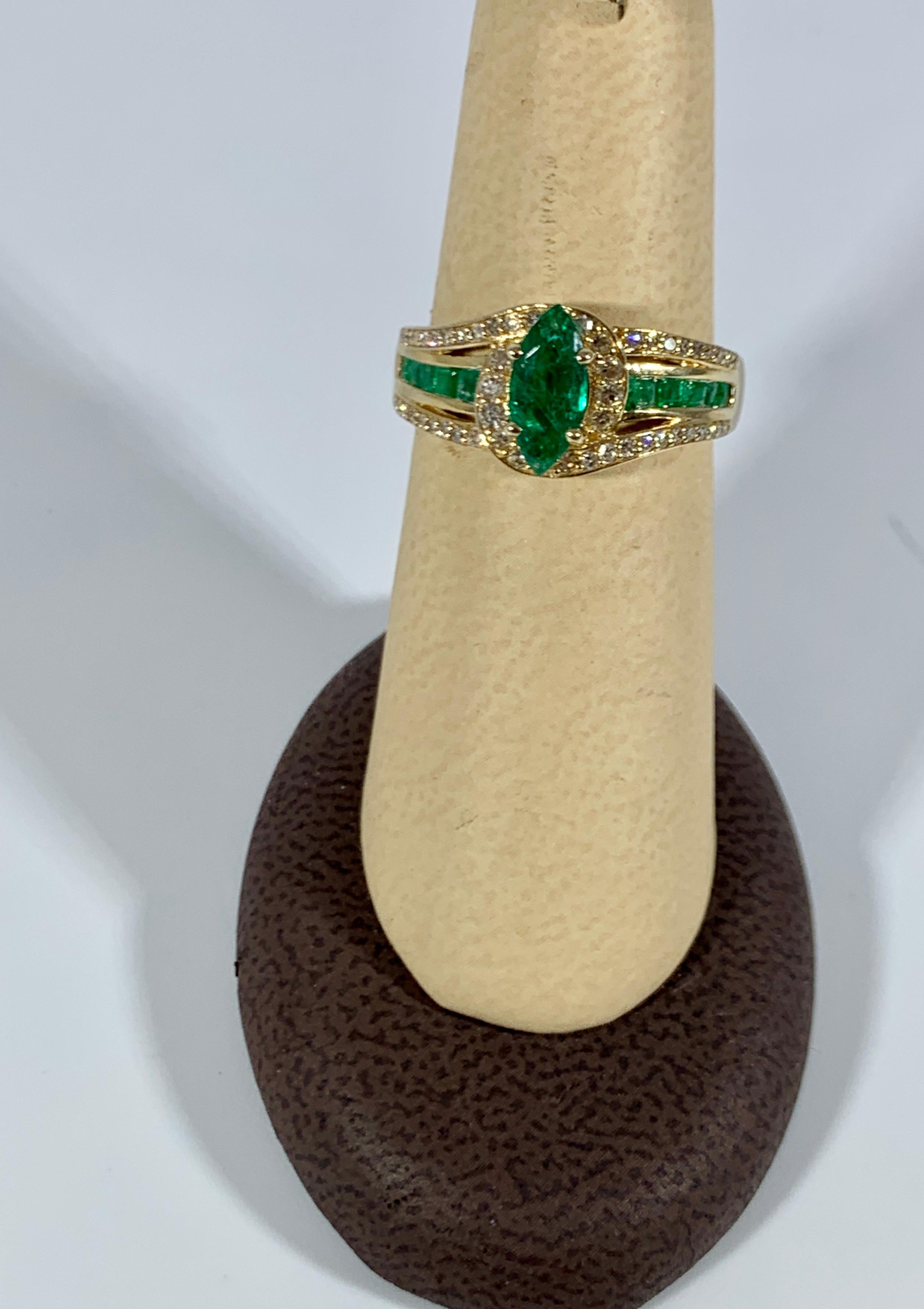 Women's Marquise Cut Emerald and Diamond Ring 14 Karat Yellow Gold