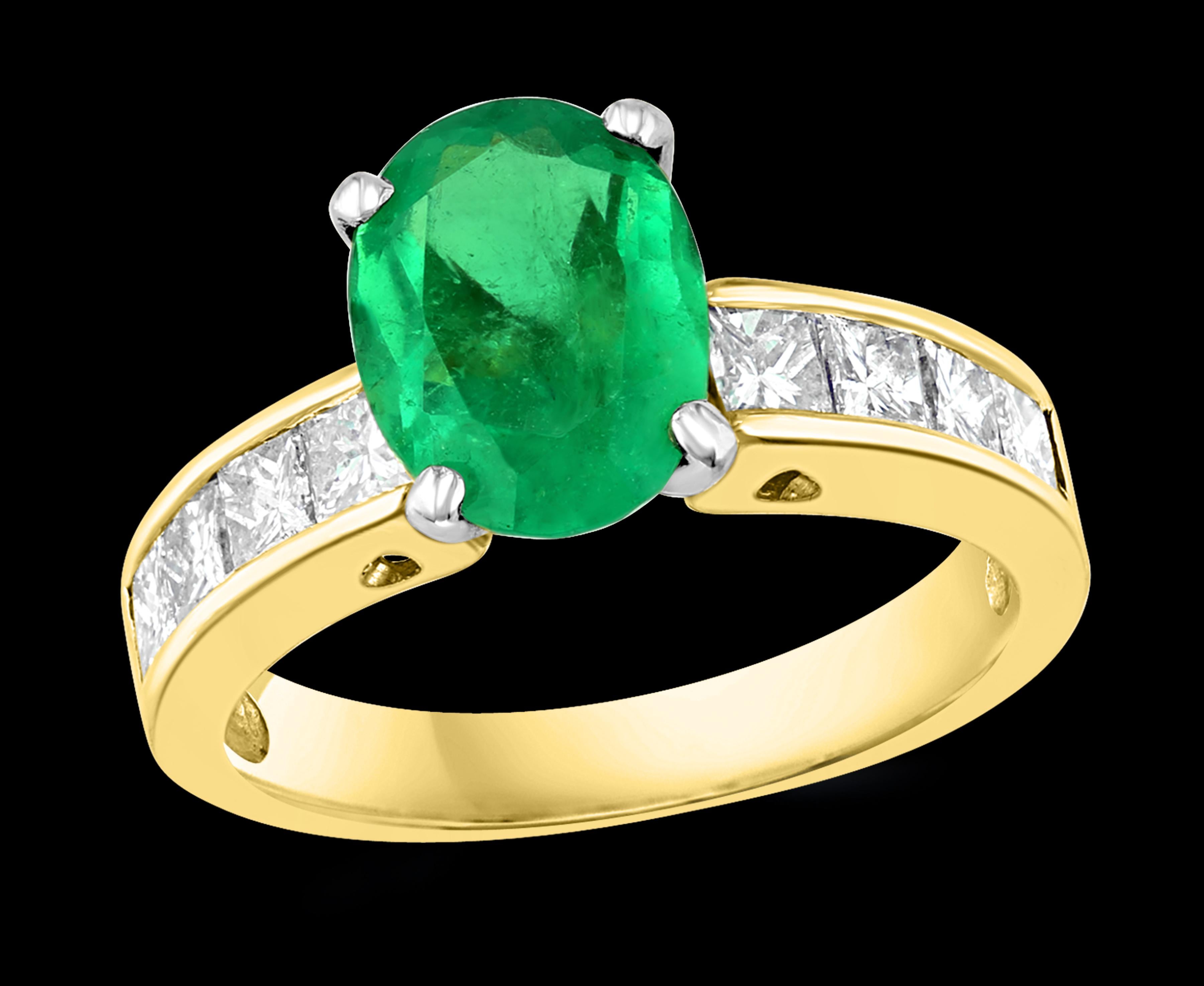 A classic, Cocktail ring 
9 X 7 Oval Cut  Emerald And Diamond  Ring 14 Karat Yellow Gold Size 4.5
Oval Shape  Emerald Ring 
very clean and intense green color . 4  Princess cut  Diamond on both side of the band
Total diamonds 0.30 Ct
 Emeralds are