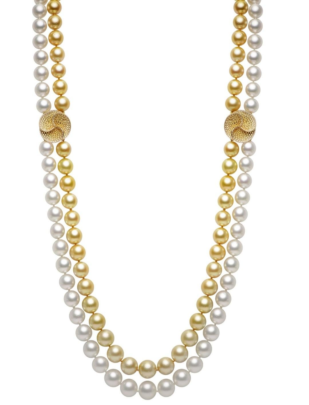 The Following Item we are Offering is this Magnificent 18KT Gold Long Double Strand South Sea Pearl and Golden South Sea Pearl Necklace. This Gorgeous Necklace features Large Gorgeous Opera South Sea Pearl strand and Opera Golden Pearl strand all in