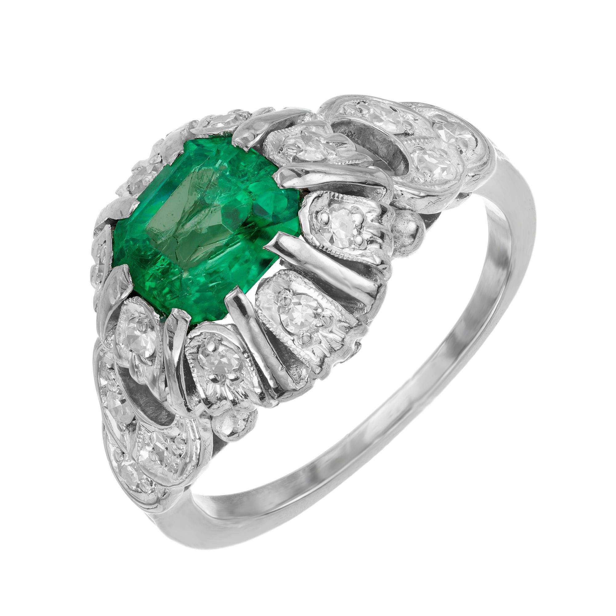 1900's Victorian bright green emerald cut .90 carat emerald and diamond Victorian engagement ring. Original platinum setting with 14 round accent diamonds with a current size of 4. The beautiful rectangular emerald cut center stone is AGL certified