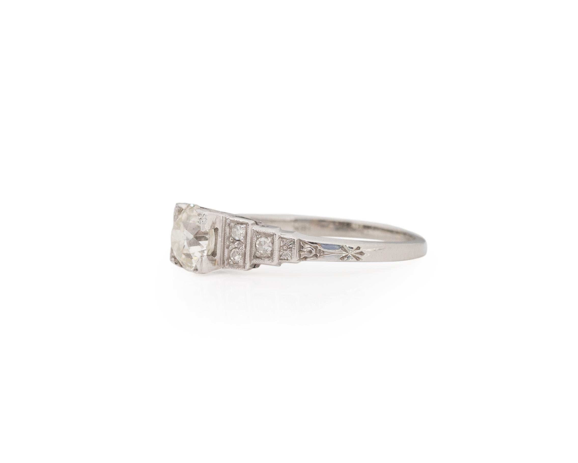 Ring Size: 6.5
Metal Type: Platinum [Hallmarked, and Tested]
Weight: grams

Center Diamond Details:
Weight: .90ct
Cut: Old European brilliant
Color: K
Clarity: VS

Finger to Top of Stone Measurement: 5.5mm
Shank/Band Width: 1.7mm
Condition: Excellent
