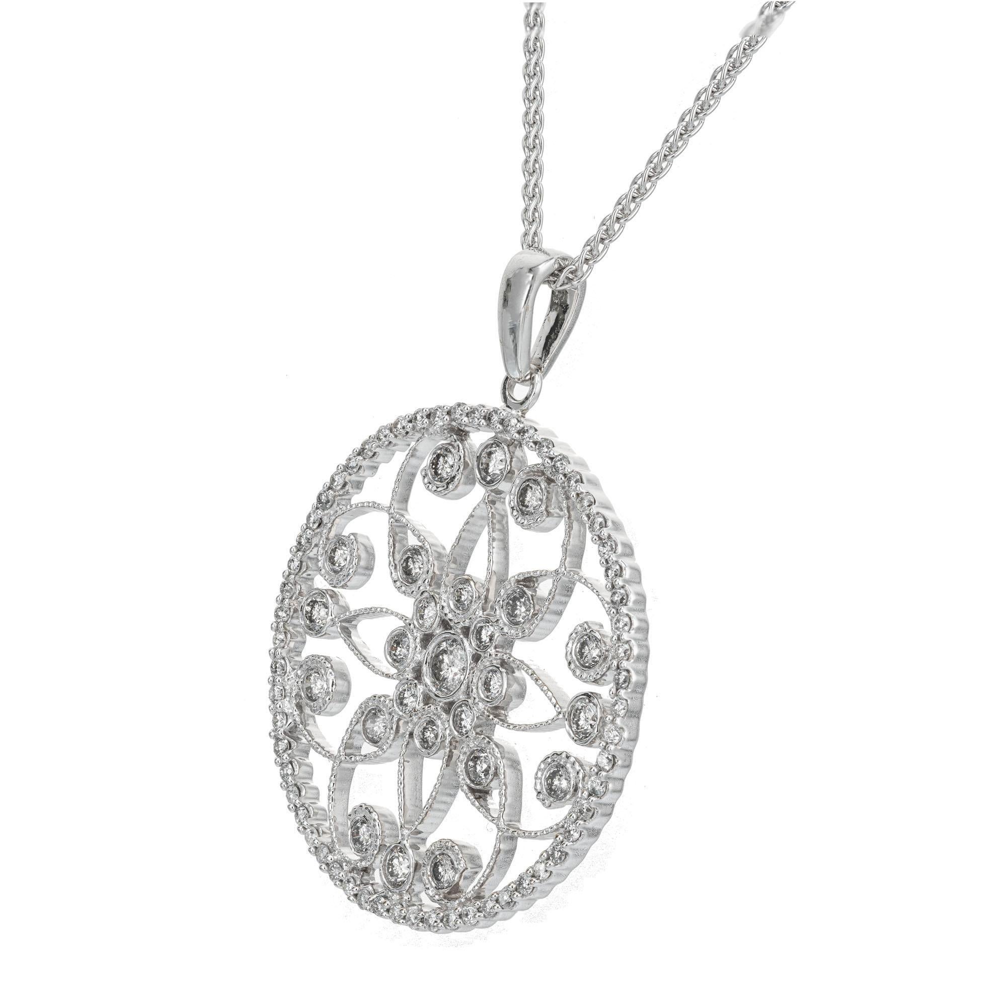 Diamond pendant necklace. Set with 84 round brilliant cut diamonds set in 14k white gold. 16 Inch wheat chain with a lobster catch.

84 round brilliant cut diamonds, H-I SI-I approx. .90cts
14k white gold 
Stamped: 14k
8.8 grams
Top to bottom: