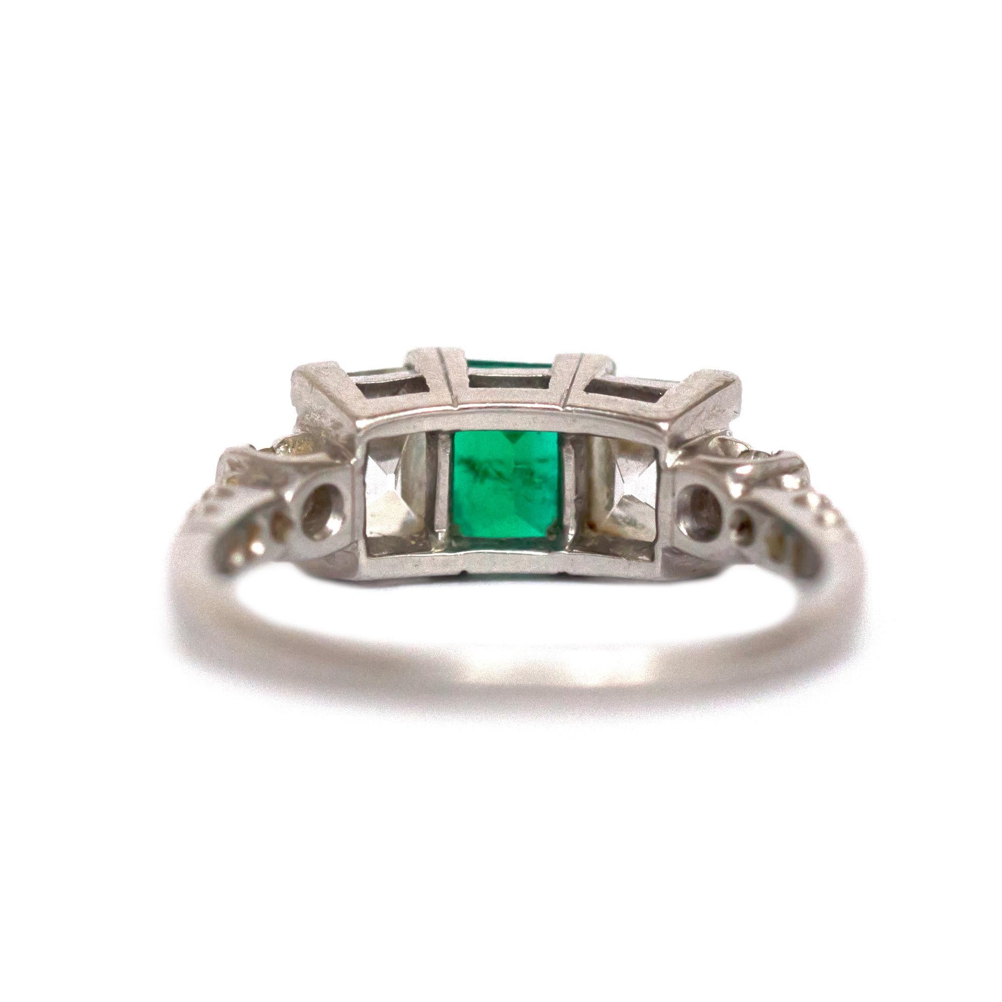 Art Deco .90 Carat Emerald Platinum Engagement Ring For Sale
