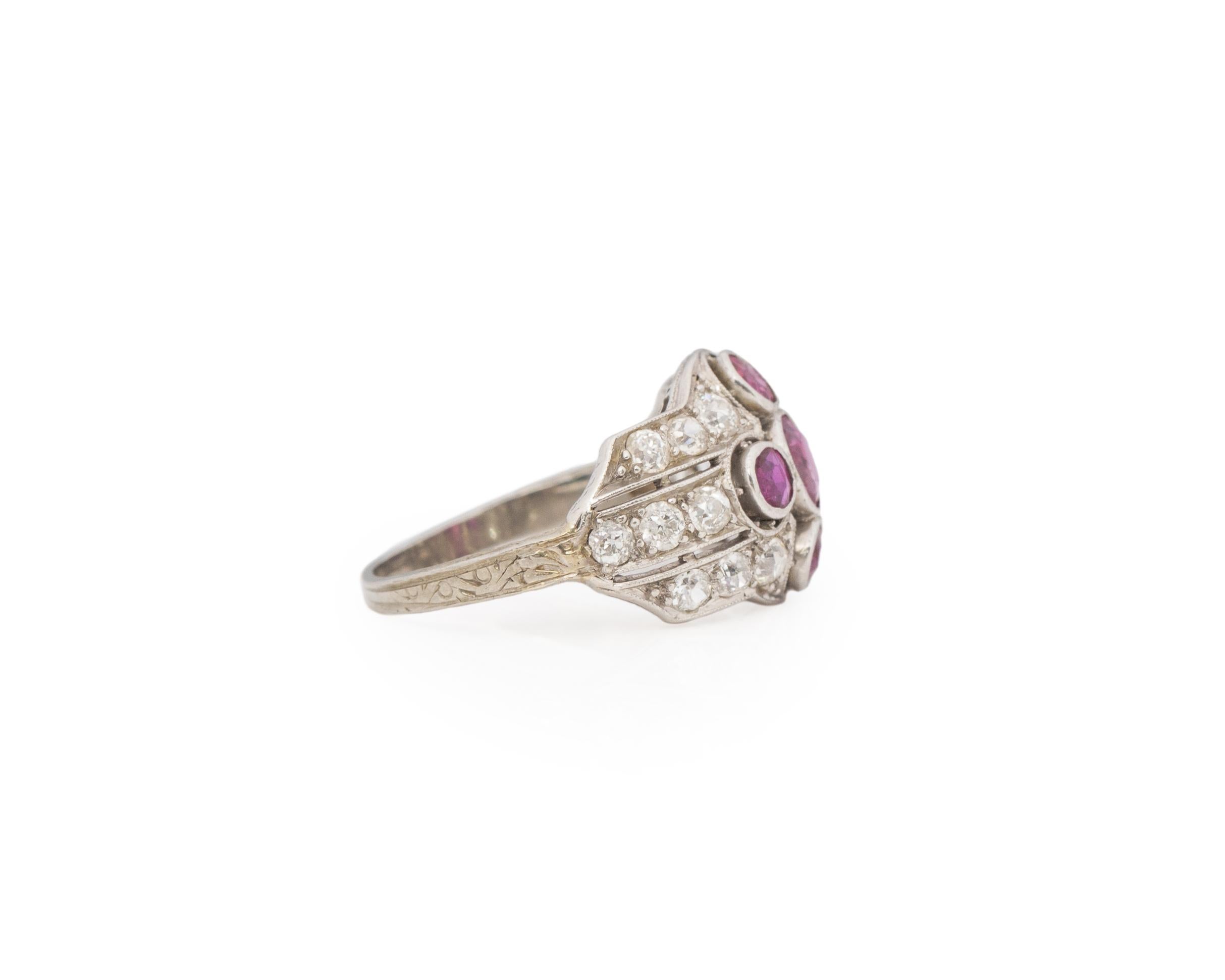 Ring Size: 5.25
Metal Type: Platinum [Hallmarked, and Tested]
Weight: 4.1grams

Ruby Details:
Weight: .90ct, total weight
Cut: Old Mine Brilliant
Color: Intense Pink-Red
Clarity: VS

Side Diamond Details:
Weight: .90ct, total
Cut: Old European