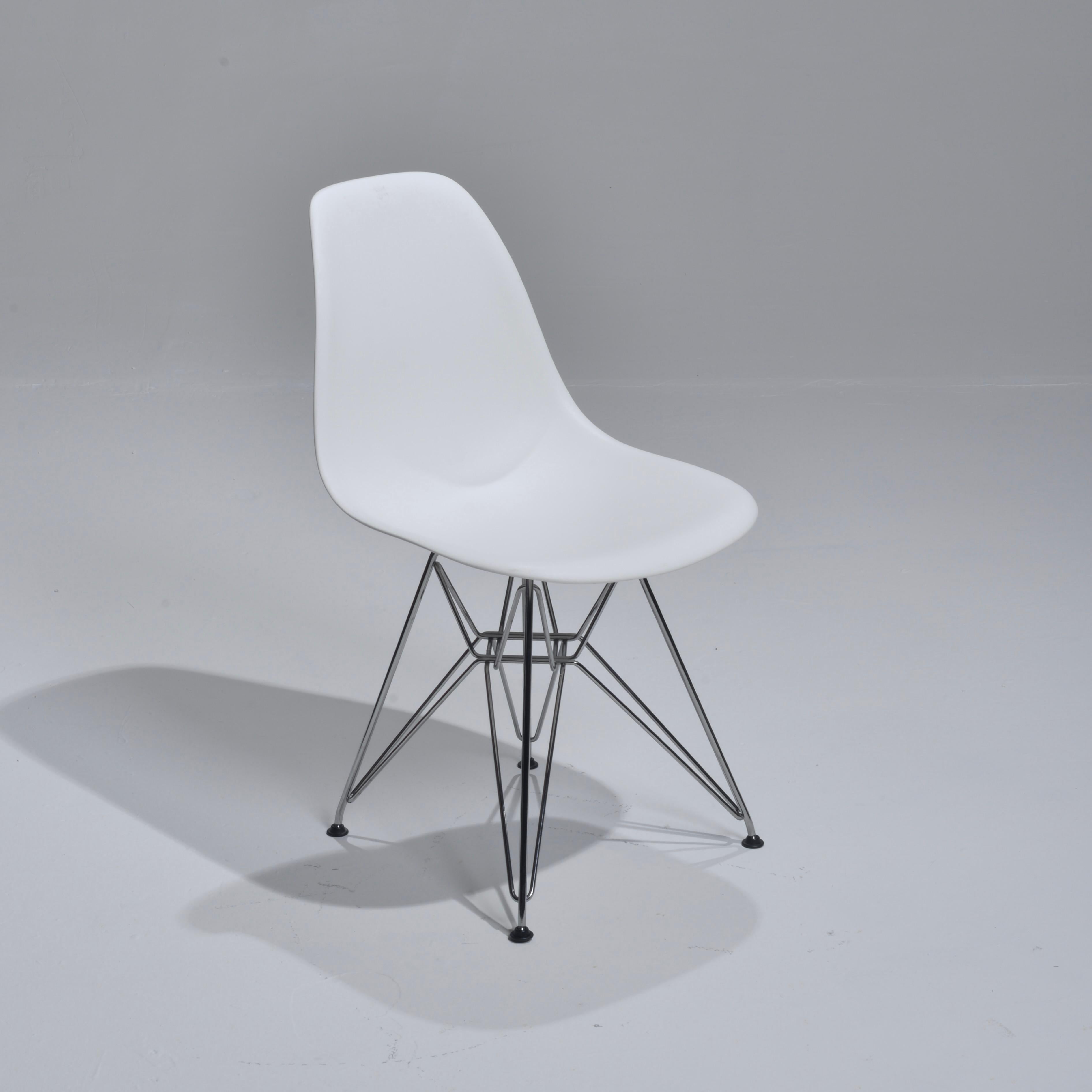 We have 65 of the these original Herman Miller polypropylene molded chairs designed by Ray and Charle Eames. We have 65 white chairs.
 
