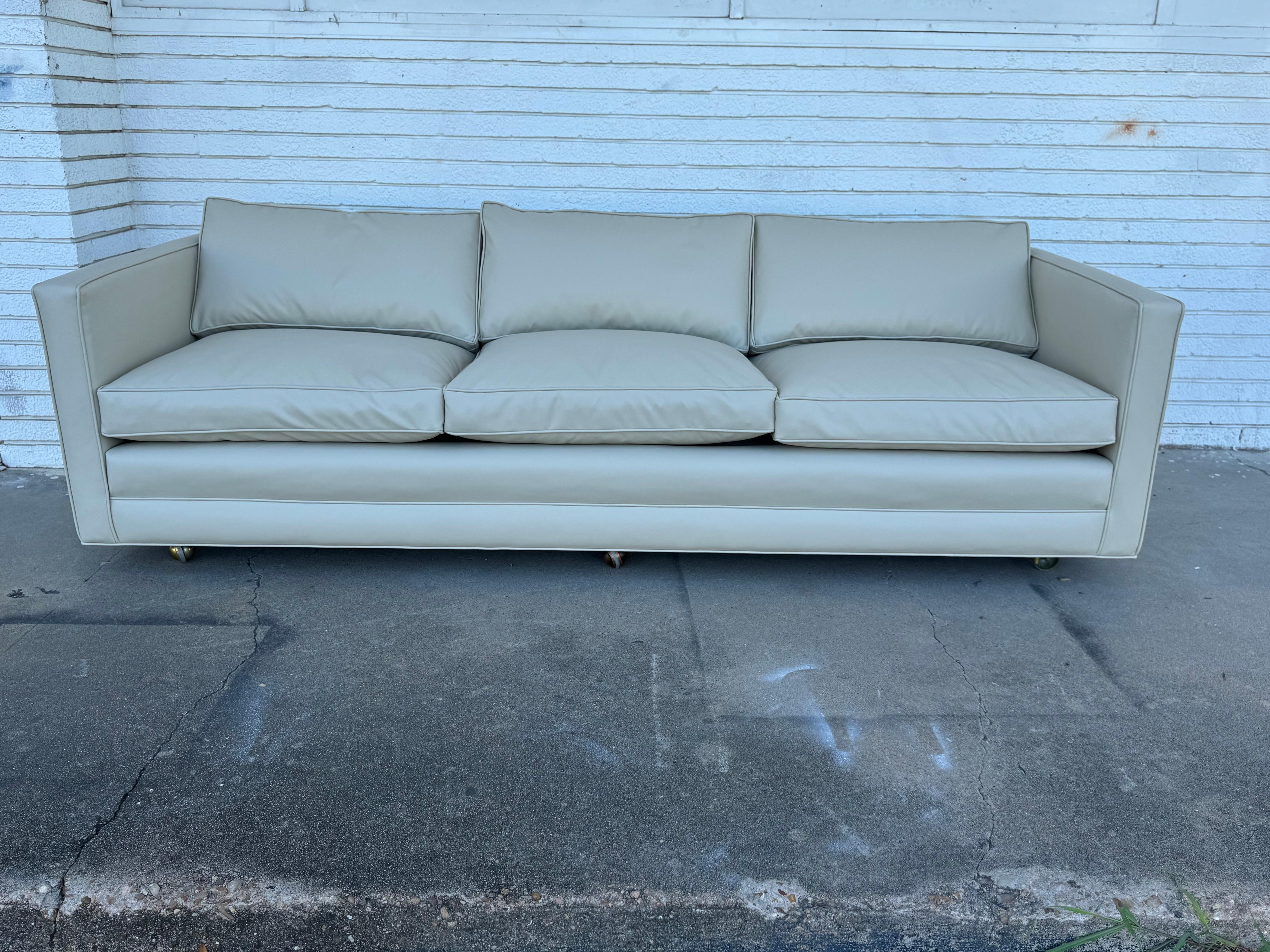 This is an even arm Tuxedo sofa by Dunbar Furniture.
It has 3 cushioned seats and is on casters for easy movability.
It has be newly reupholstered in a rich off white Ultra Fabric.
 
We also have a matching loveseat and lounge chairs. 