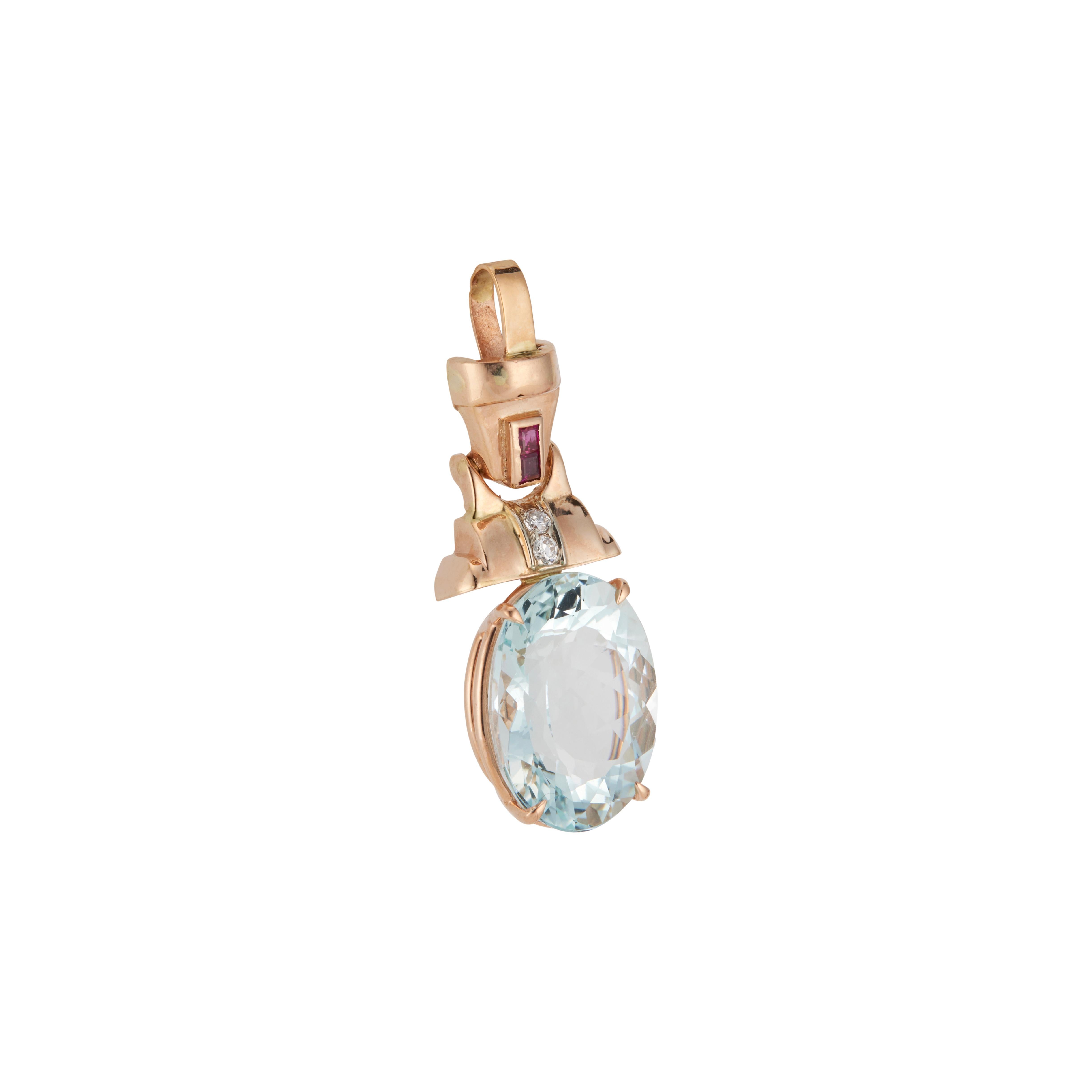 Retro Art Deco Aqua, diamond and ruby pendant. 9.00ct oval natural aqua set in 14k rose gold setting with two round rubies and two full cut round diamonds. circa 1930-1940. 

1 bright greenish blue oval natural Aqua, approx. total weight 9.00cts,