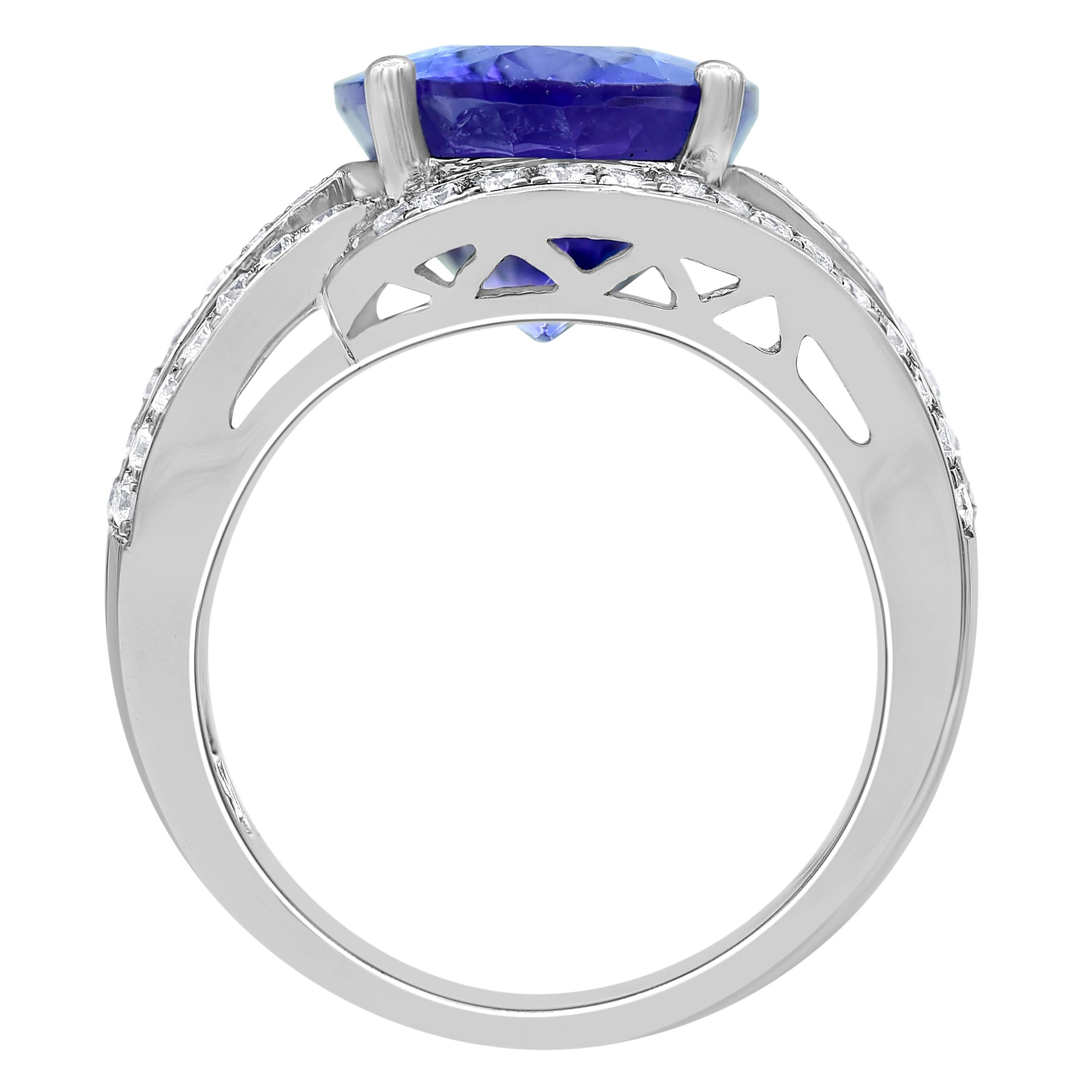 Oval Cut 9.00 Carat Diamond and Tanzanite 14K White Gold Prong Set Triple Row Ring For Sale