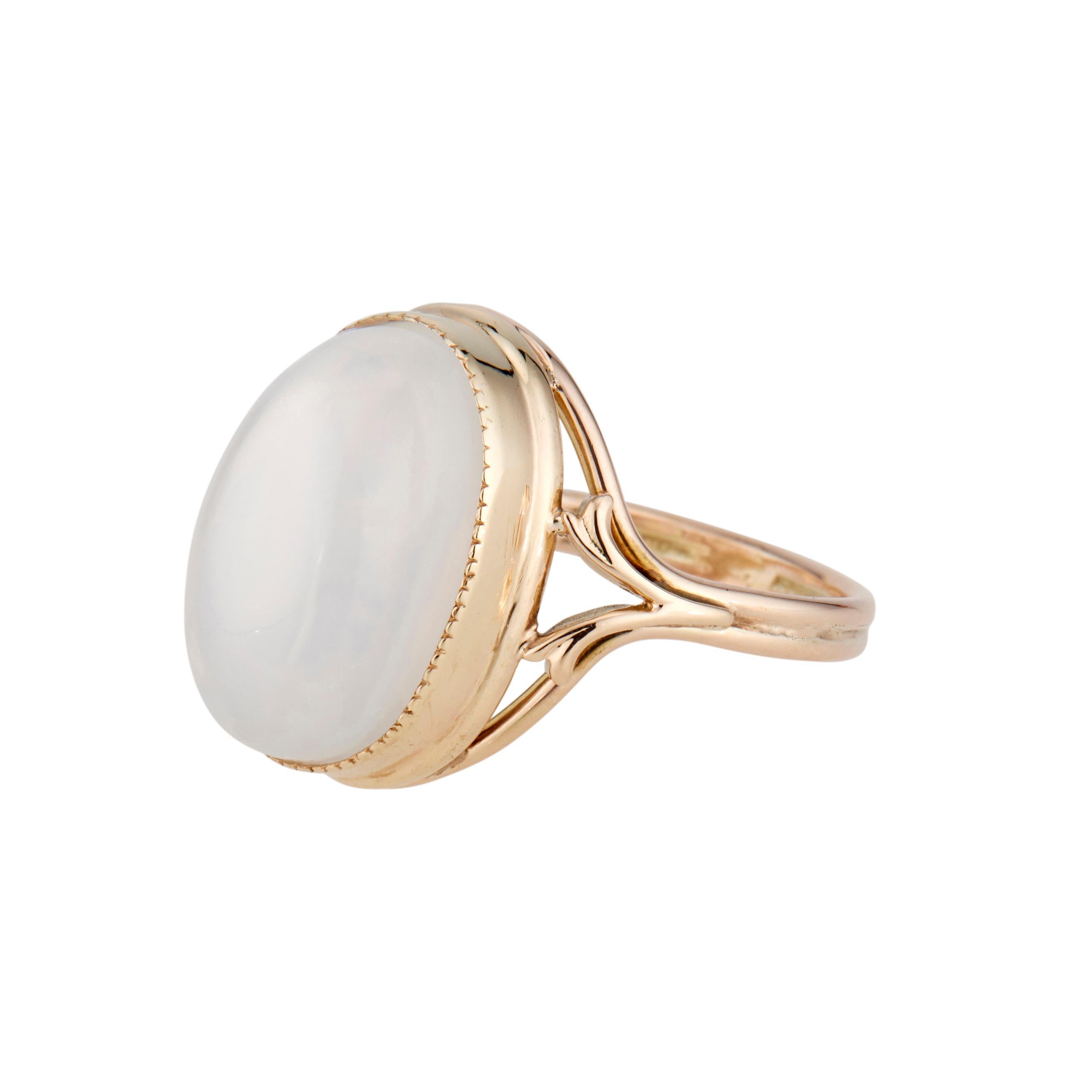 Glowing translucent 9.00 carat oval moonstone center stone in a 14k yellow gold setting. Circa 1940

1 oval cabochon clear white moonstone, VS approx. 9.00cts 
Size 6 and sizable
14k yellow gold
4.7 grams
Width at top: 16.8mm
Height at top: