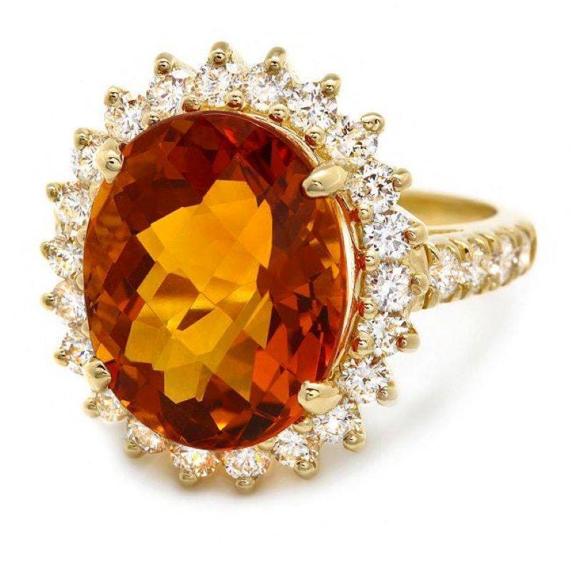 9.00 Carats Impressive Natural Citrine and Diamond 14K Yellow Gold Ring

Total Natural Citrine Weight is: Approx. 7.90 Carats

Citrine Measures: Approx. 14.00 x 11.00mm

Natural Round Diamonds Weight: Approx. 1.10 Carats (color G-H / Clarity