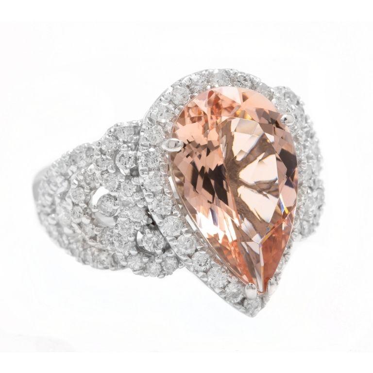 9.00 Carats Exquisite Natural Morganite and Diamond 18K Solid White Gold Ring

Total Natural Morganite Weight is: Approx. 7.00 Carats

Morganite Measures: Approx. 15.29 x 7.90mm

Natural Round Diamonds Weight: Approx. 2.00 Carats (color G-H /