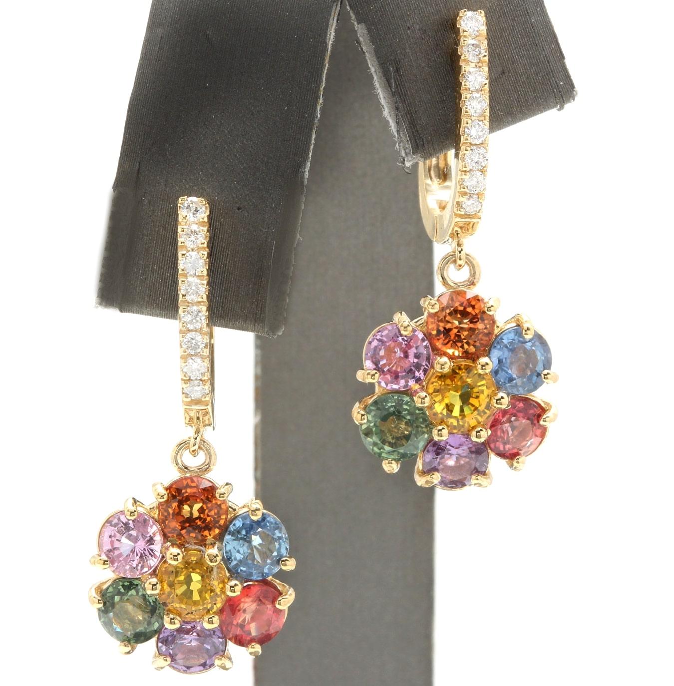 9.00 Carats Natural Multi-Color Sapphire 14K Solid Yellow Gold Earrings

Amazing looking piece! 

Total Natural Round Cut Sapphire Weight is Approx. 9.00 Carats (both earrings)

Sapphire Measures: Approx. 4.85mm

Earring Diameter: 14.60mm

Earring
