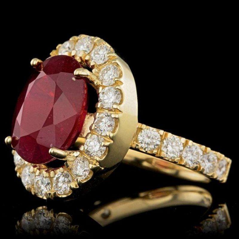 9.00 Carats Natural Red Ruby and Diamond 14K Yellow Gold Ring

Total Red Ruby Weight is: Approx. 7.40 Carats

Natural Oval Red Ruby Measures: Approx. 12.00 x 10.00mm

Ruby treatment: Fracture Filling

Natural Round Diamonds Weight: Approx. 1.60