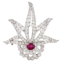 900. platinum brooch set with 4.62 carats of round brilliant diamonds