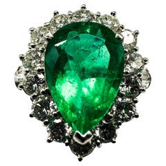 900 Platinum Ring Featuring Emeralds and Diamonds