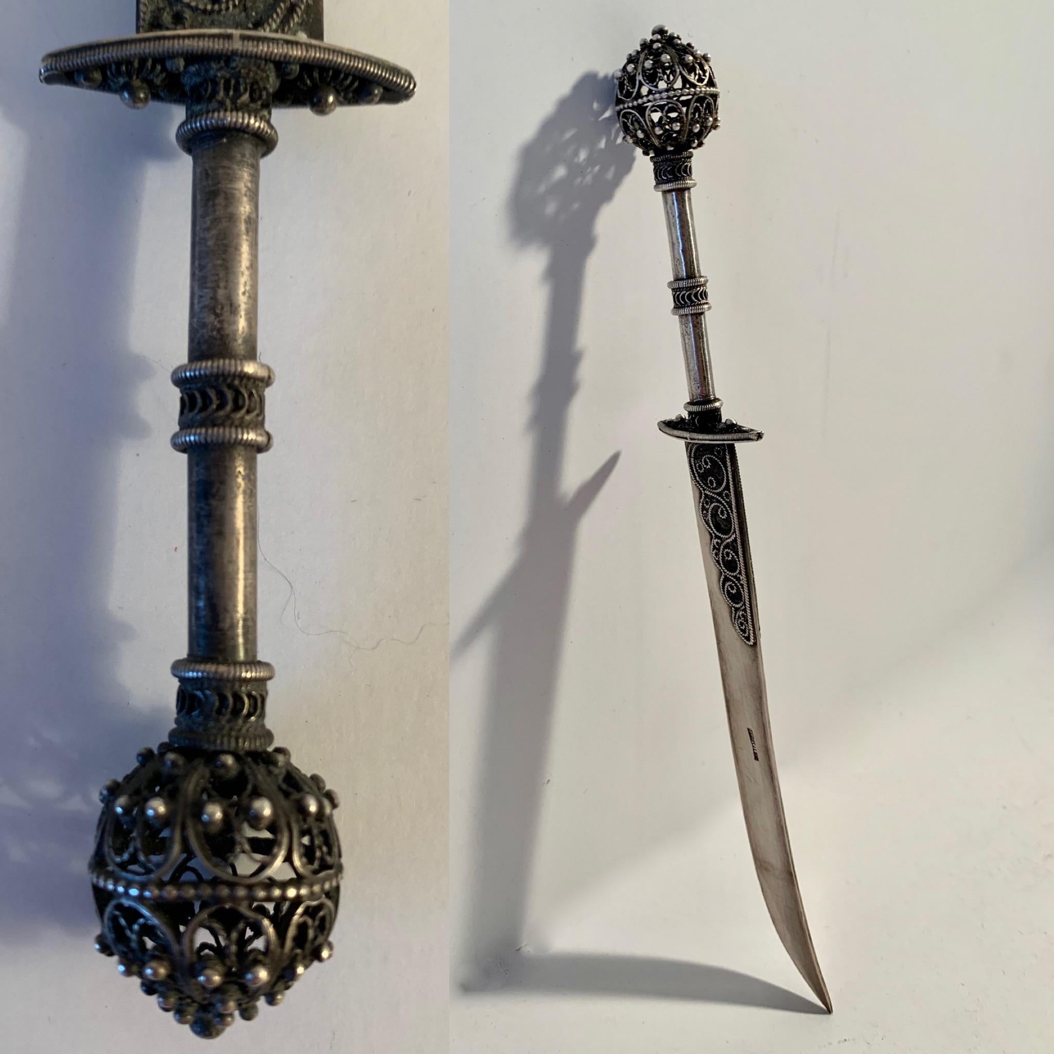 Solid 900 silver filagree letter opener - a very sharp and dagger style opener stamped Jerusalem. A stunning compliment to any desk - a functional work of art. Paper opener.