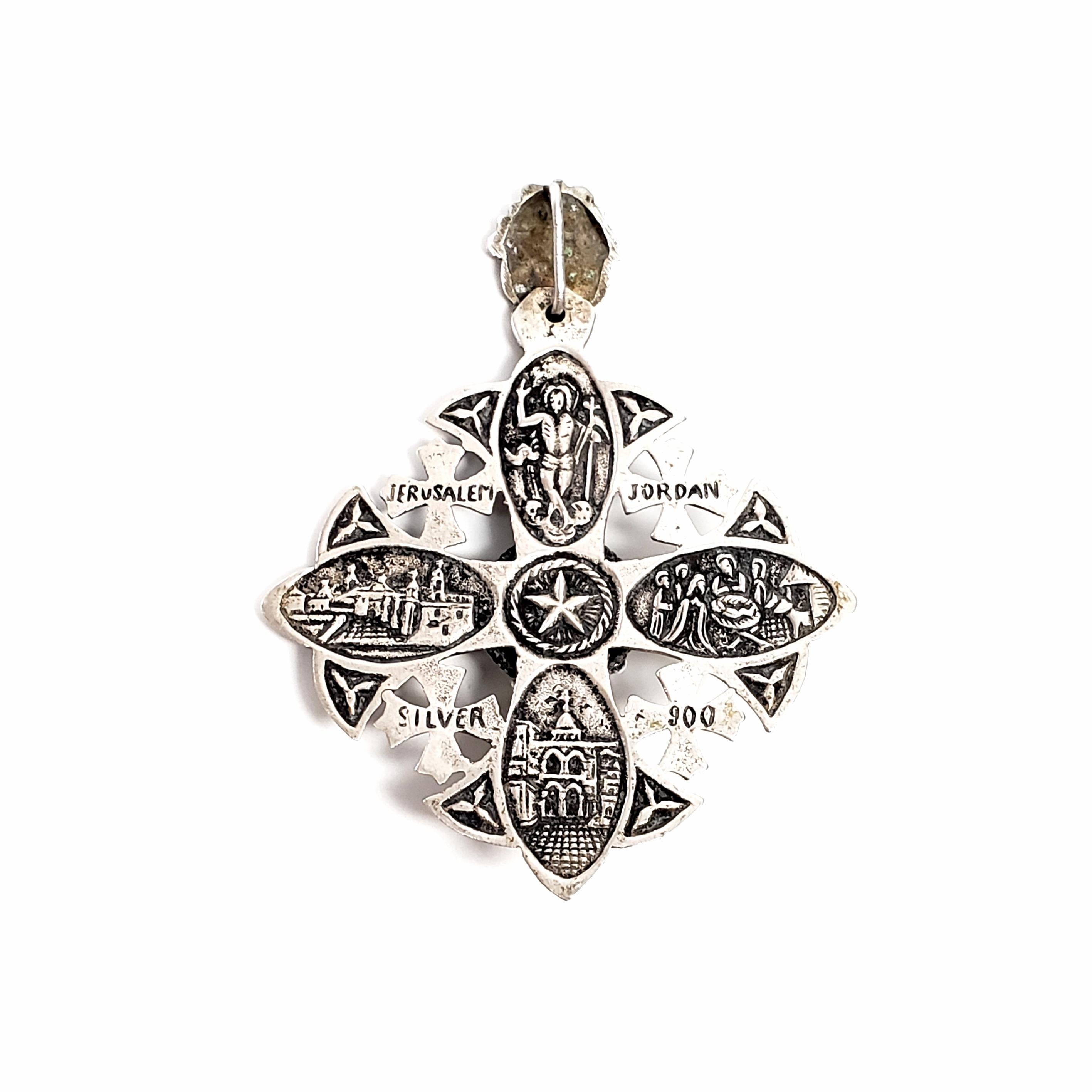 Vintage sterling silver crusaders cross pendent.

Beautifully ornate design on the front, etched religious scenes on the back.

Measures 2 5/8