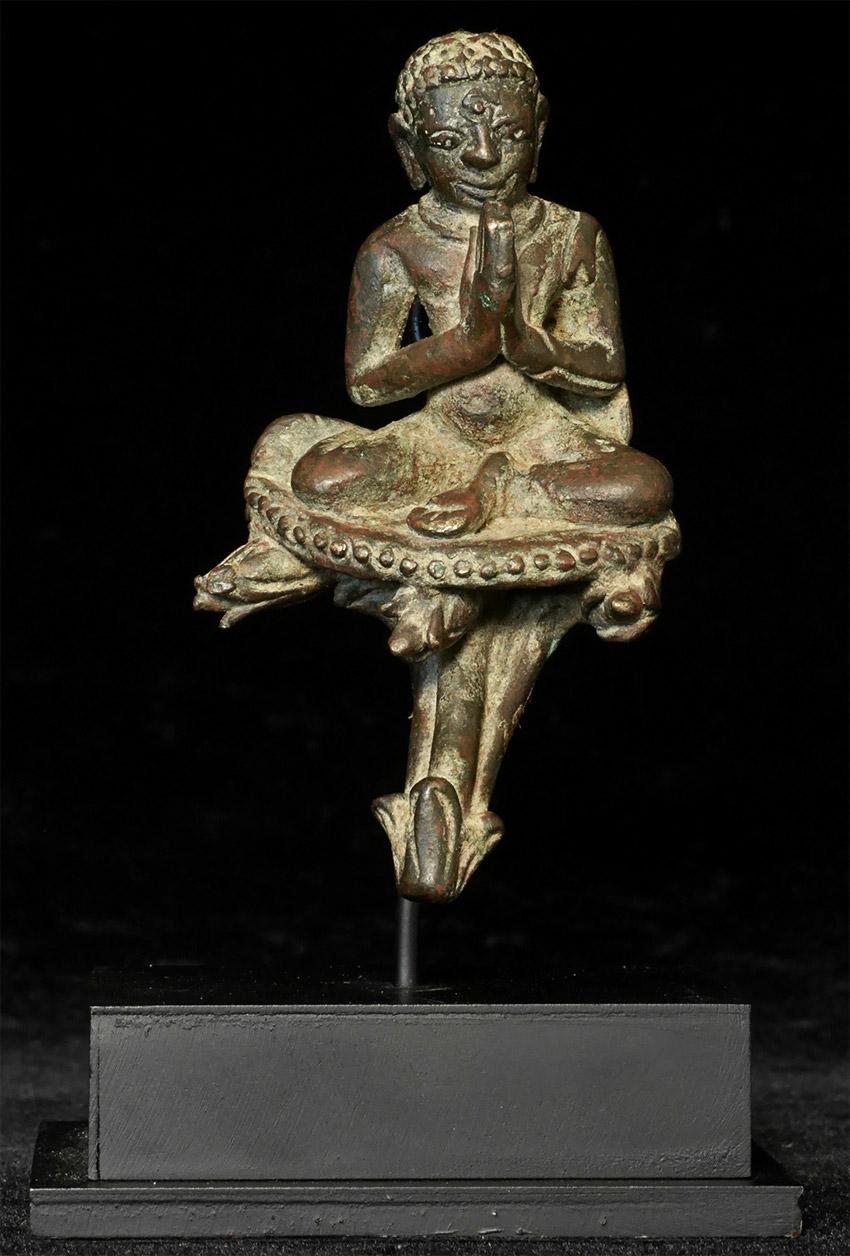 Delightful Burmese solid-cast monk is likely late Pyu to early Pagan and in the range of 900 years old. From the personal collection of a highly respected Belgian collector who specializes in very early and rare Burmese Buddhist bronzes. This is my
