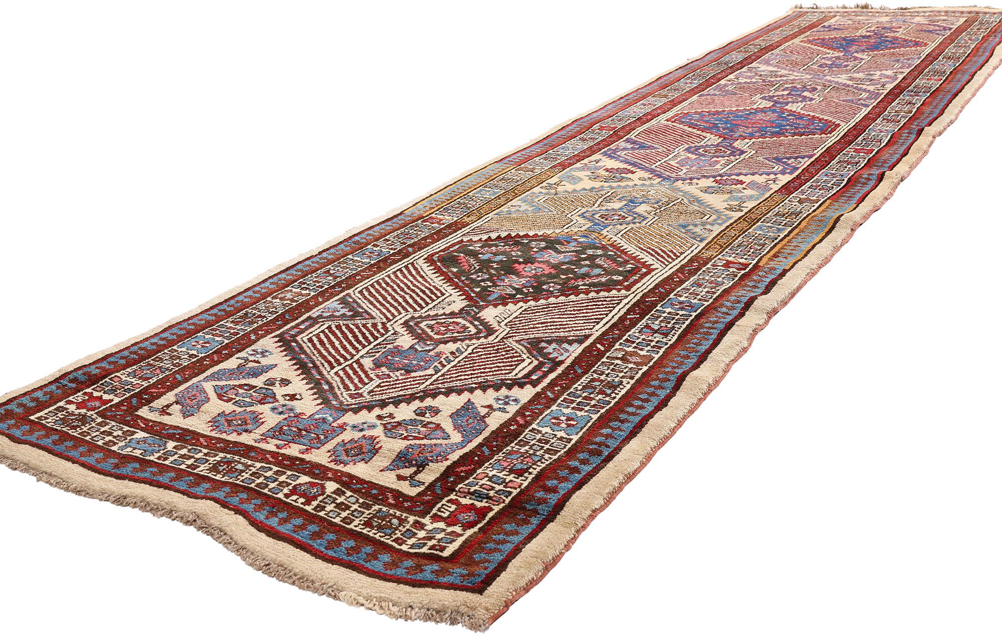 90035 Antique Persian Sarab Rug Runner, 03'04 x 14'09. Woven in the rarefied highlands of northwest Iran, this one-of-a-kind, hand-knotted wool antique Persian Sarab runner is more than a textile—it is a tailored legacy, a sacred inheritance