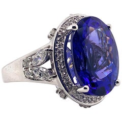 Used 9.01 Carat Oval Shaped Tanzanite Ring in 18 Karat White Gold with Diamonds
